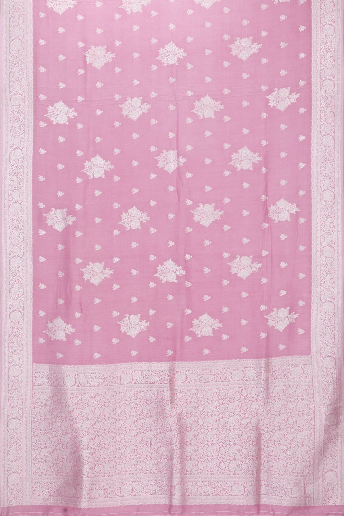 Flat view of Rose pink Blended Banarasi Silk Saree with Zari Butta on the body and Fancy Border. 