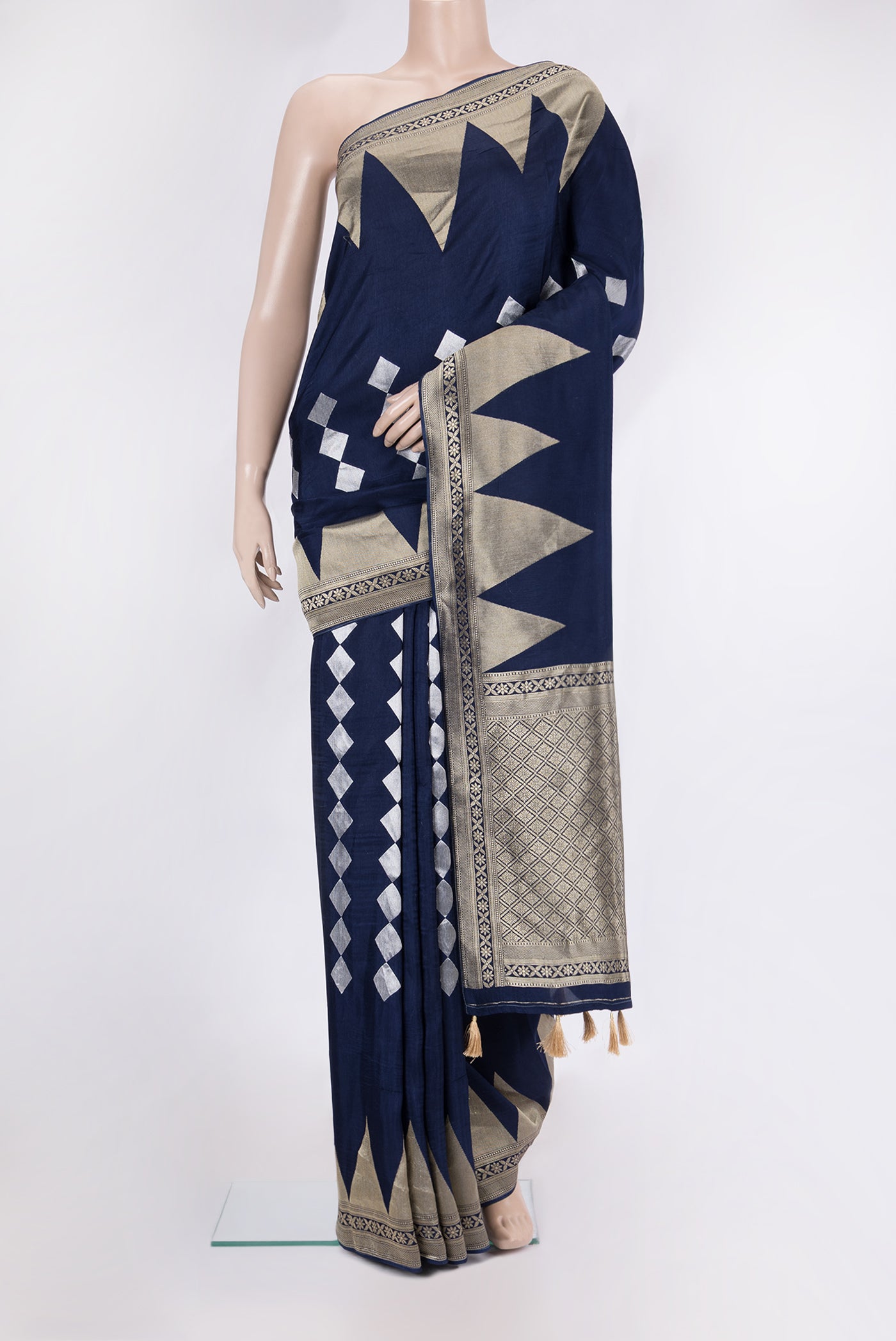Navy Blue Blended Banarasi Silk Saree with Zari Butta on the body and Fancy Border.  displayed on a mannequin