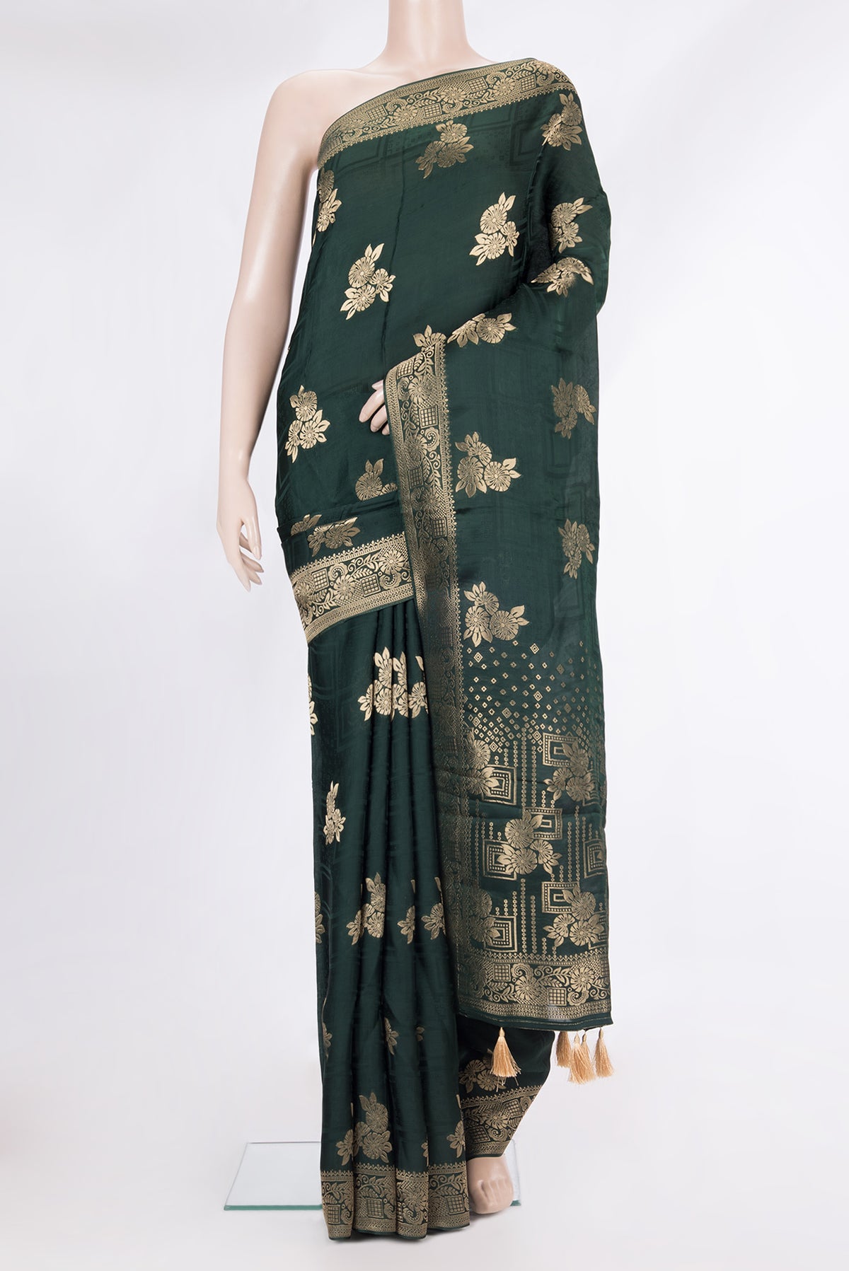 Bottle Green Blended Banarasi Silk Saree with Zari Butta on the body and Fancy Border.  displayed on a mannequin