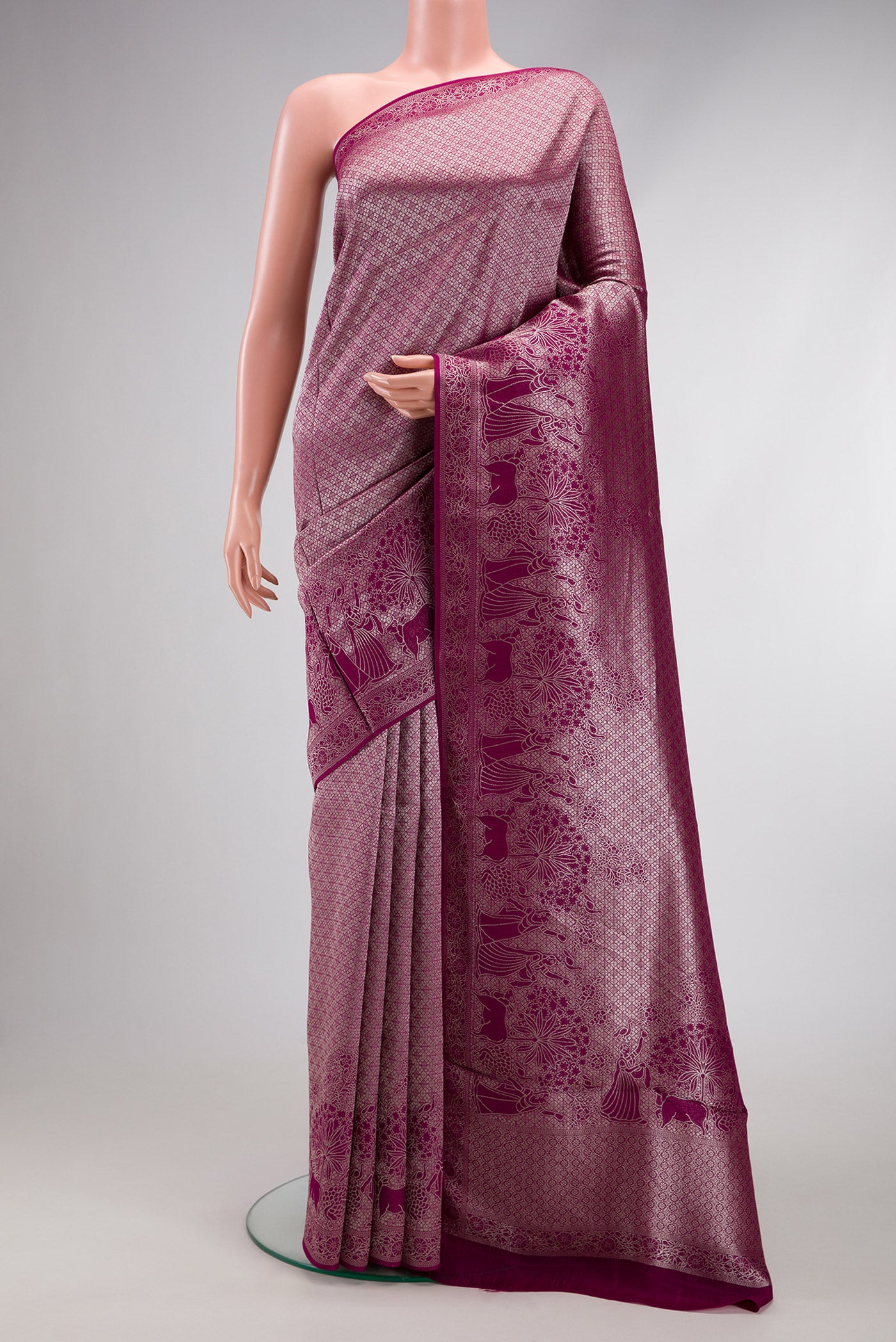 Magenta Dual Tone Blended Georgette Saree with Zari Brocade on the body and Zari Border.  displayed on a mannequin