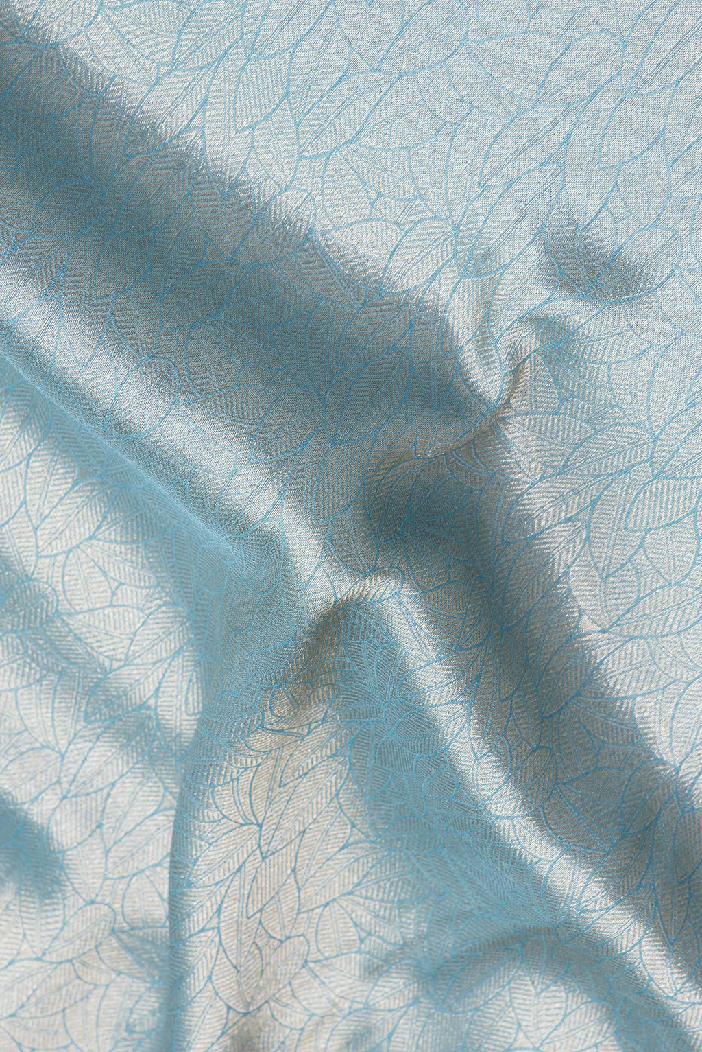 Close up of Blue Blended Banarasi Silk Saree with Zari Brocade on the body and Fancy Border.  displaying folds