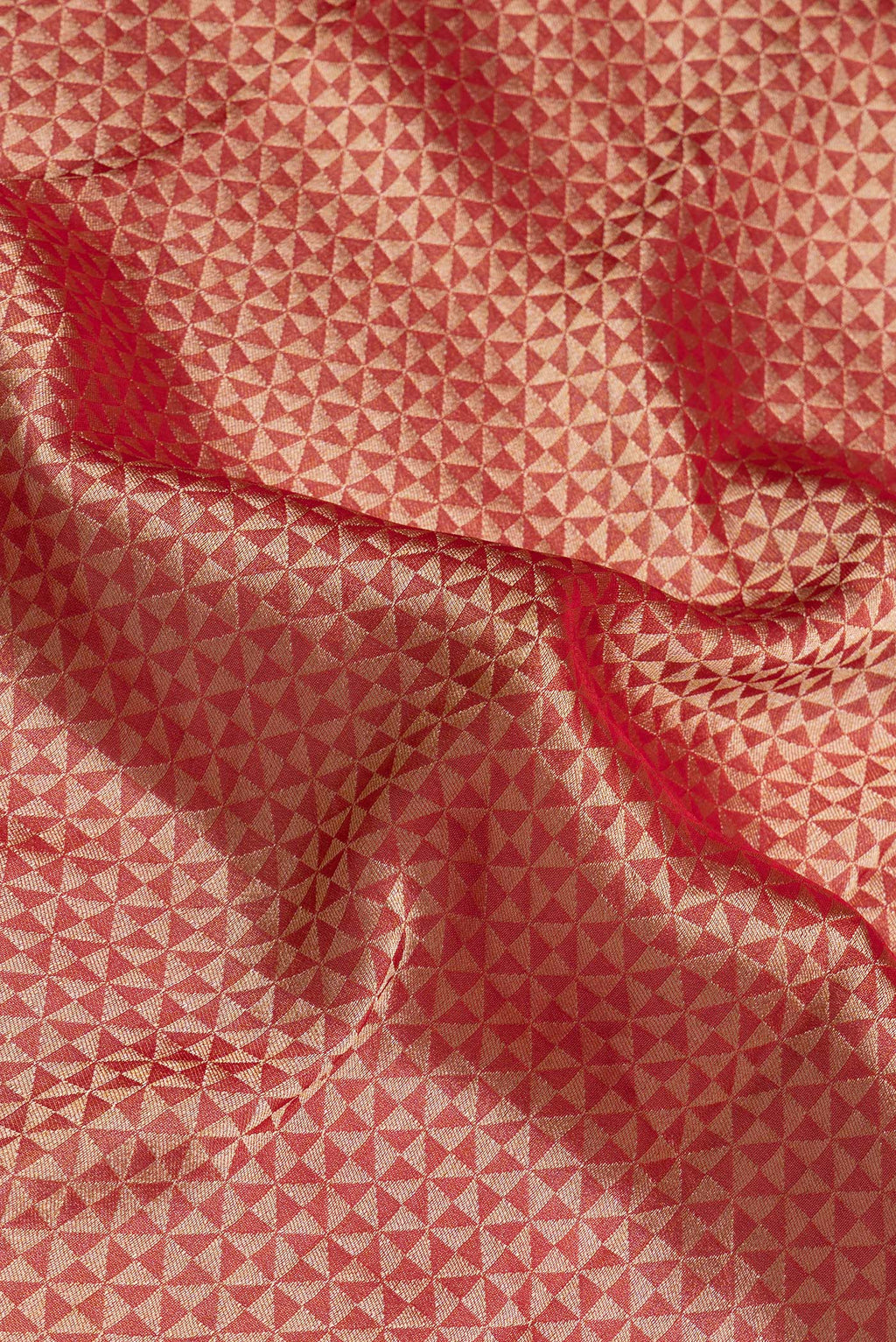 Close up of Red Blended Banarasi Silk Saree with Zari Brocade on the body and Fancy Border.  displaying folds