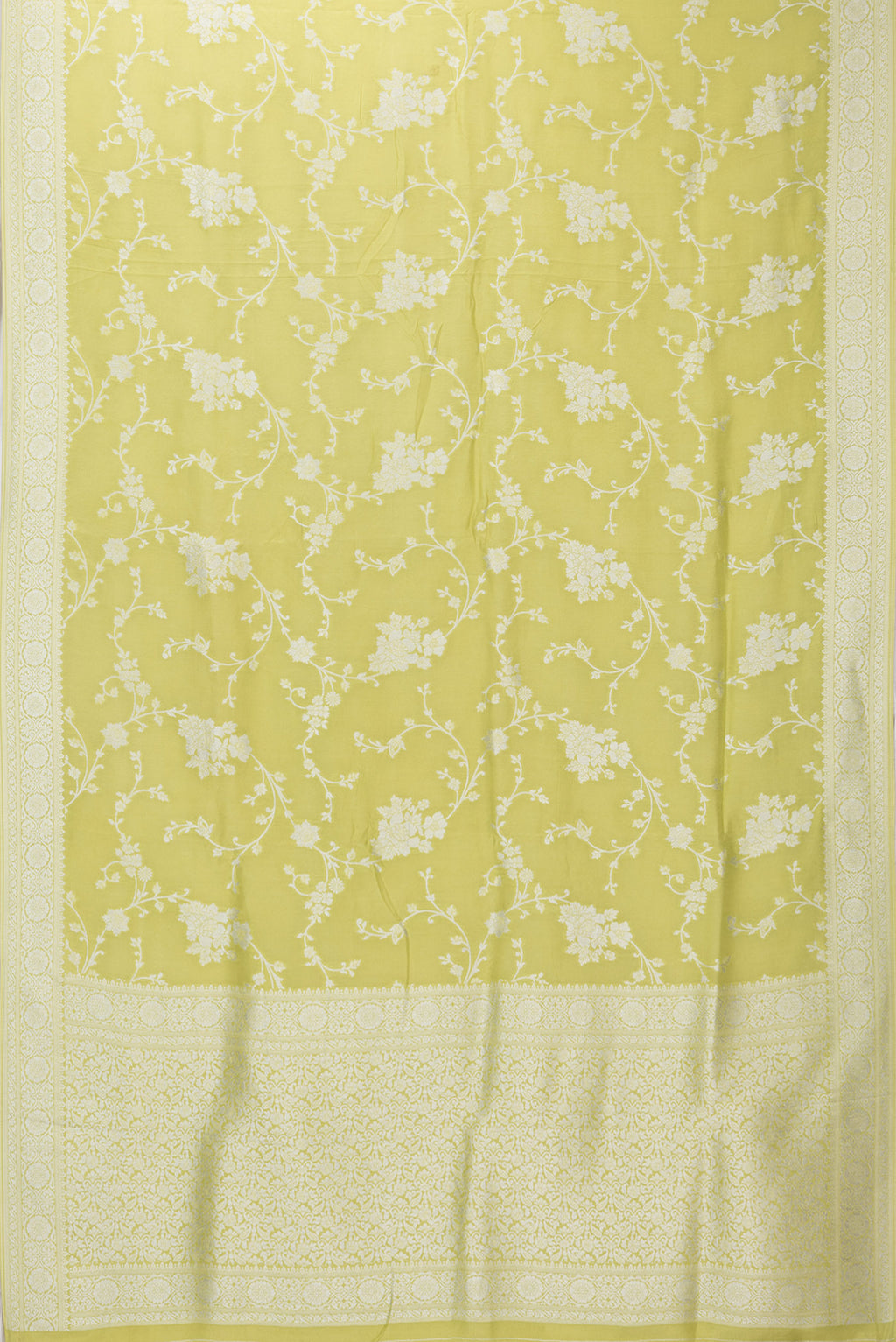 Flat view of Pista Green Blended Banarasi Silk Saree with Zari Brocade on the body and Fancy Border. 