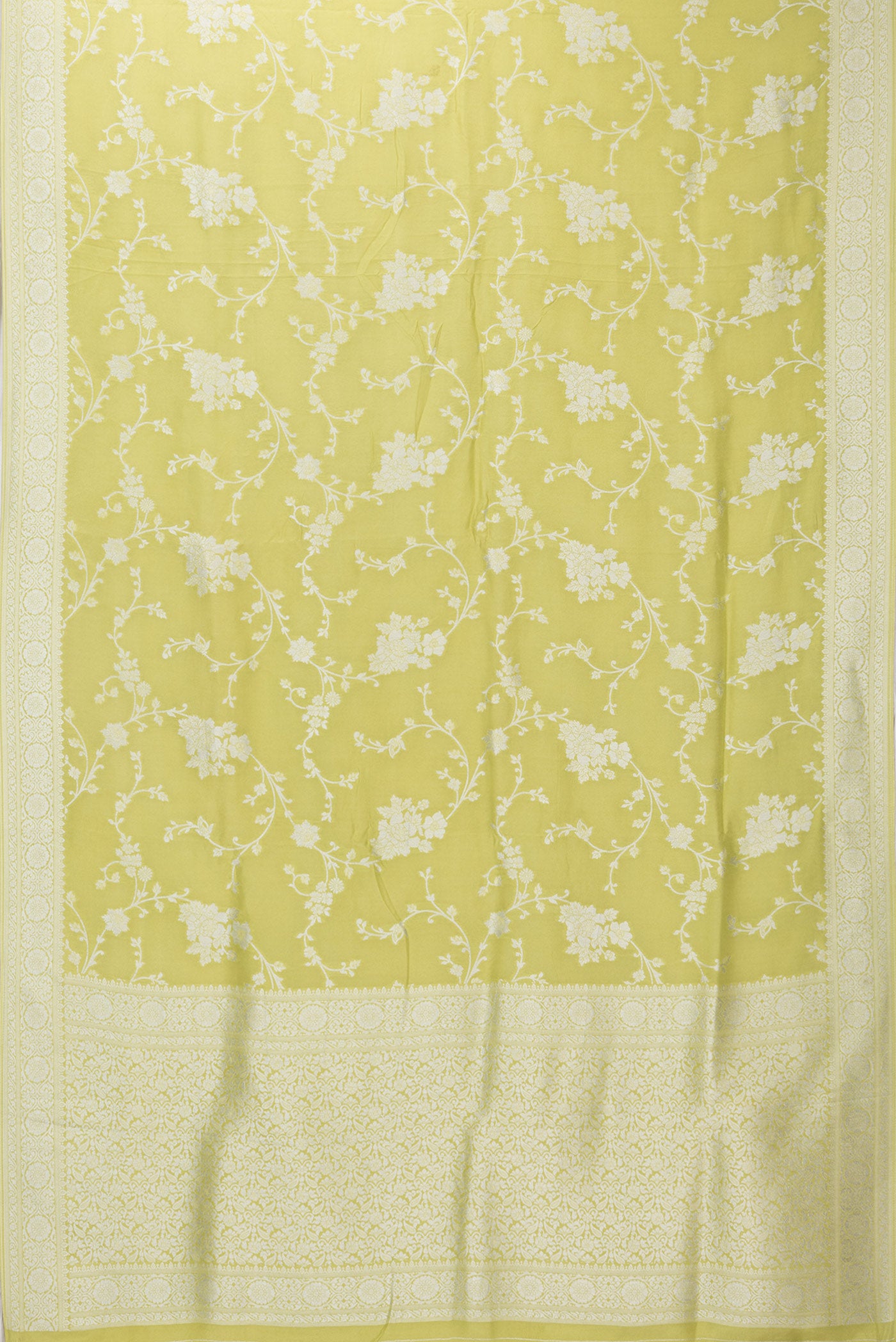 Flat view of Pista Green Blended Banarasi Silk Saree with Zari Brocade on the body and Fancy Border. 