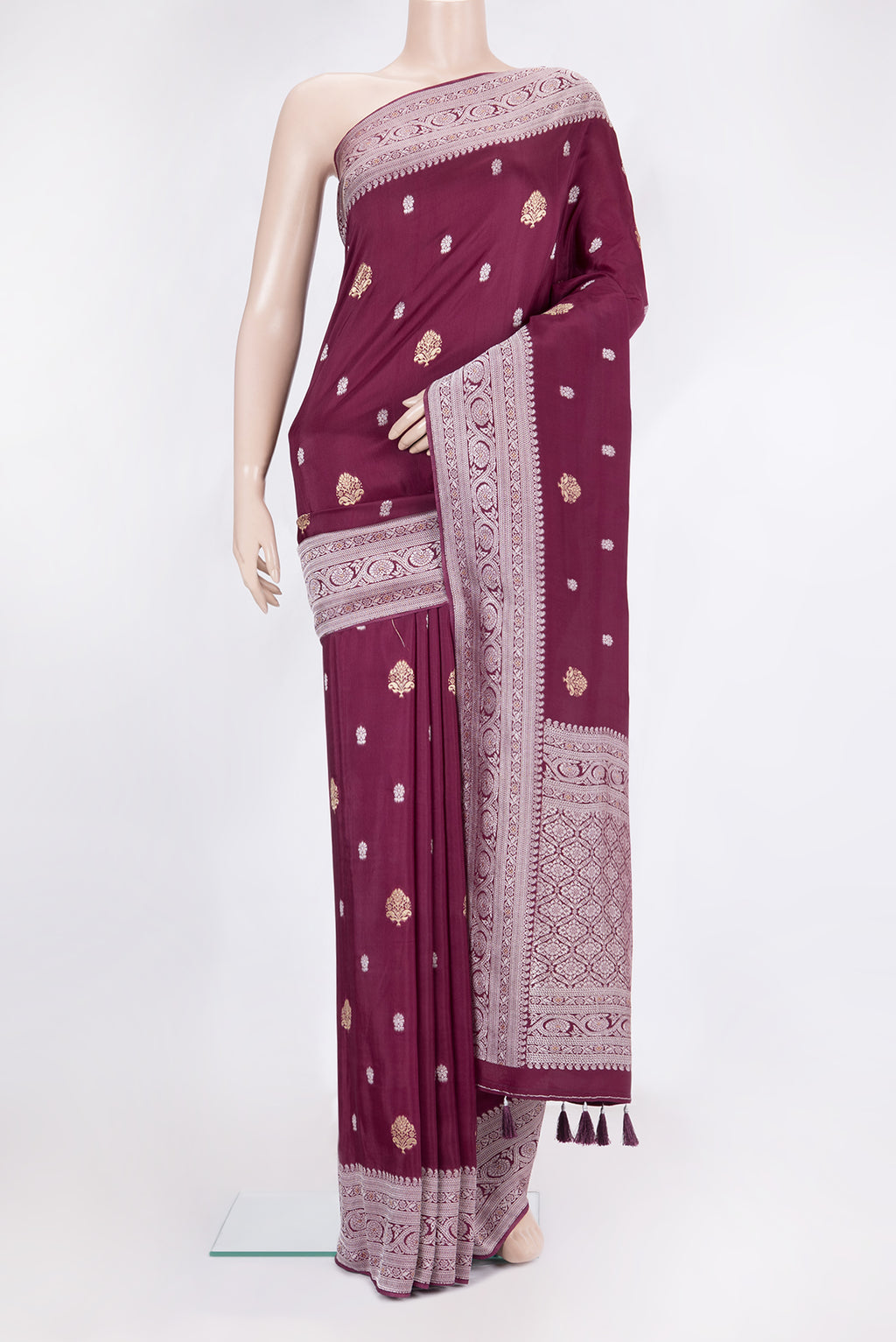 Burgundy Blended Banarasi Silk Saree with Zari Brocade on the body and Zari Border.  displayed on a mannequin