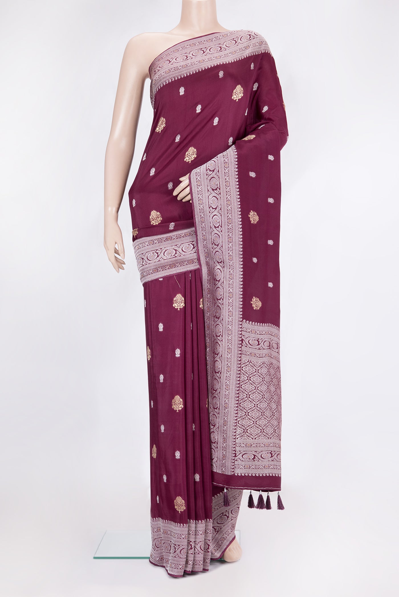 Burgundy Blended Banarasi Silk Saree with Zari Brocade on the body and Zari Border.  displayed on a mannequin