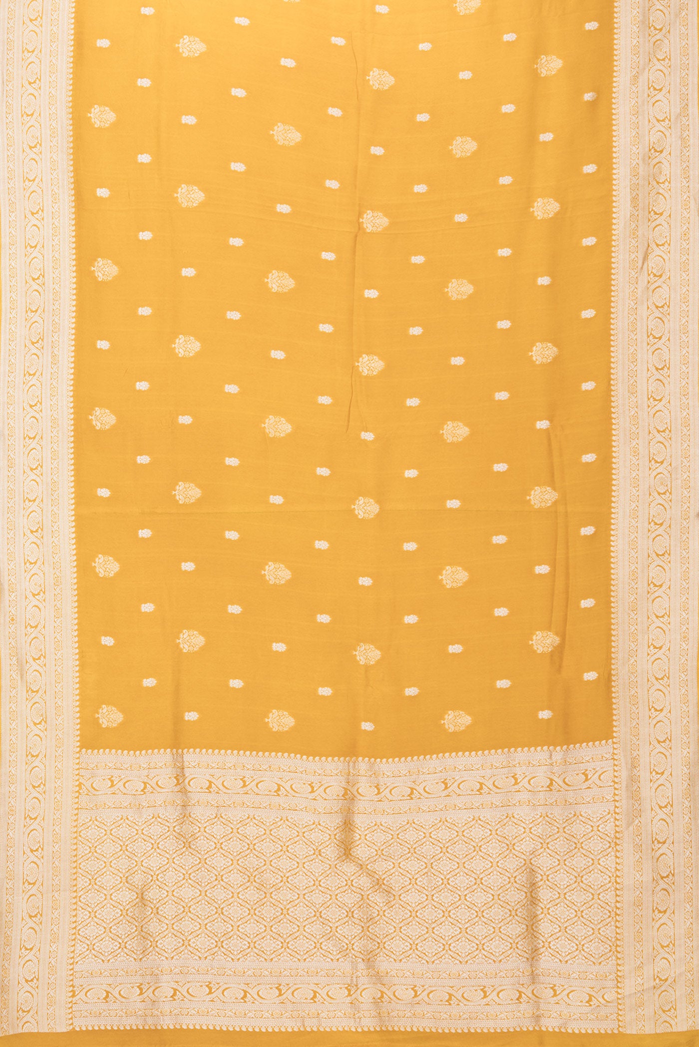 Flat view of Mustard Blended Banarasi Silk Saree with Zari Butta on the body and Fancy Border. 