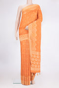 Orange Dual Tone Blended Banarasi Silk Saree with Bandhani Print on the body and Zari Border.  displayed on a mannequin