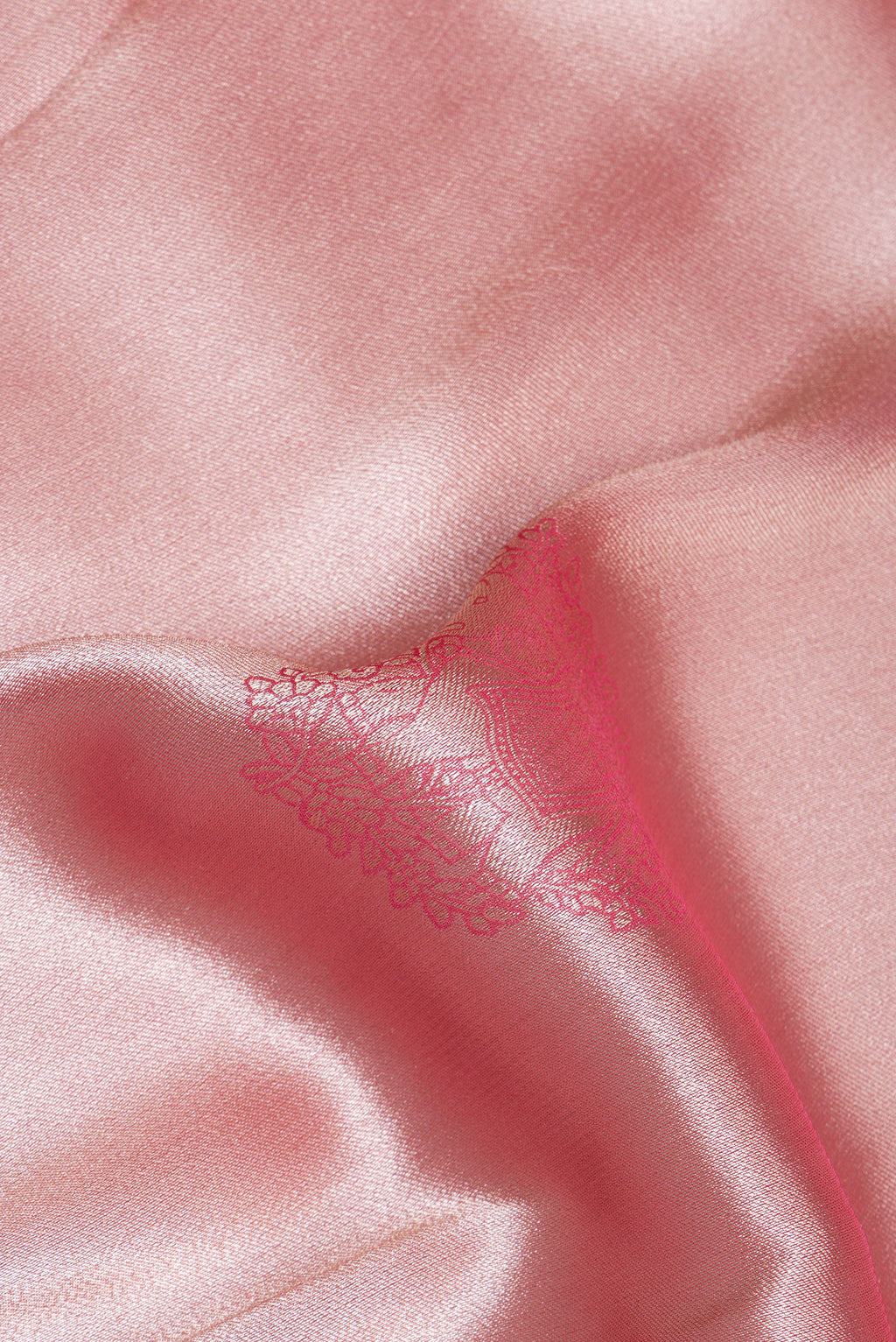 Close up of Rose Gold Dual Tone Blended Banarasi Silk Saree with Zari Brocade on the body and Zari Border.  displaying folds