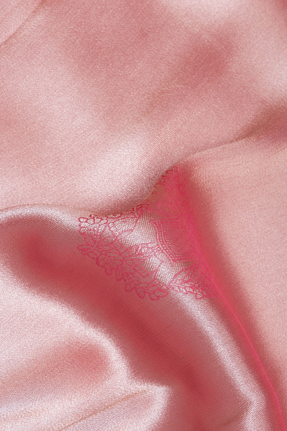Close up of Rose Gold Dual Tone Blended Banarasi Silk Saree with Zari Brocade on the body and Zari Border.  displaying folds