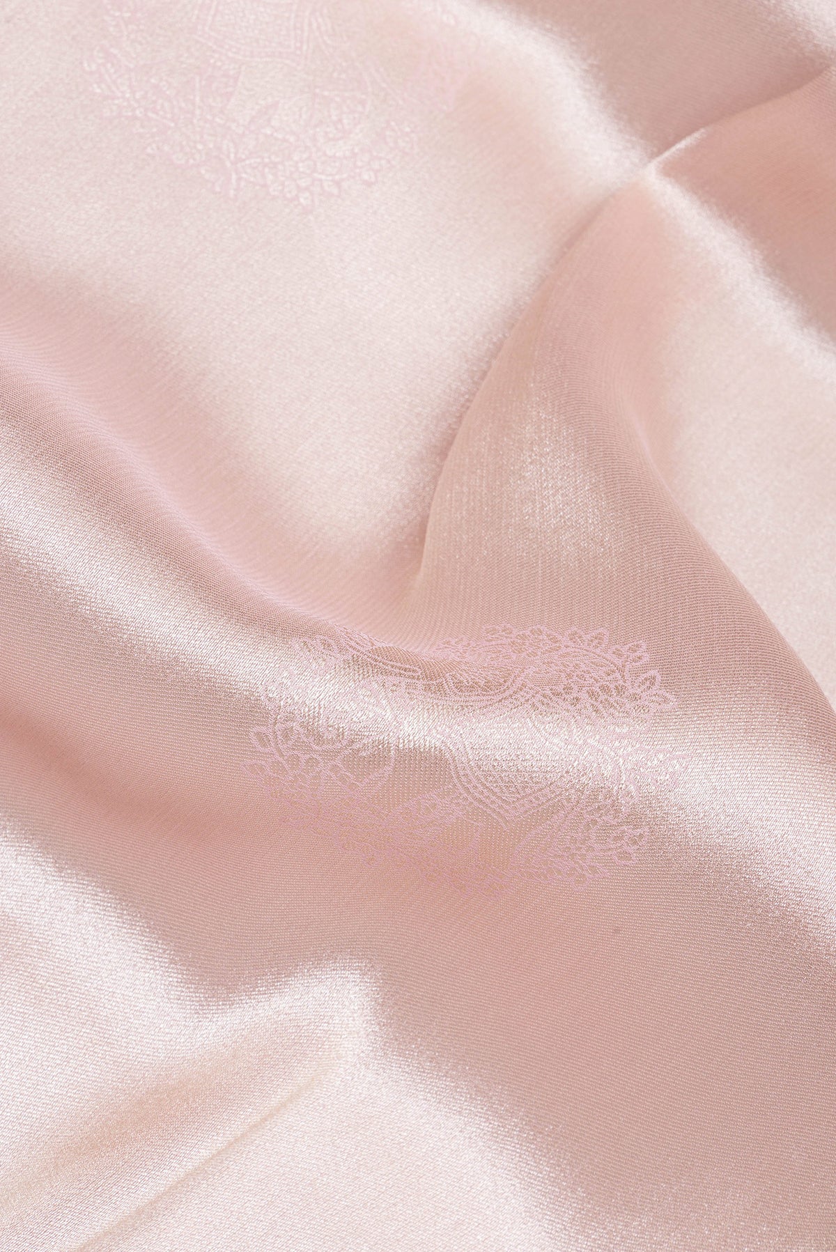 Close up of Rose Gold Dual Tone Blended Banarasi Silk Saree with Zari Brocade on the body and Zari Border.  displaying folds