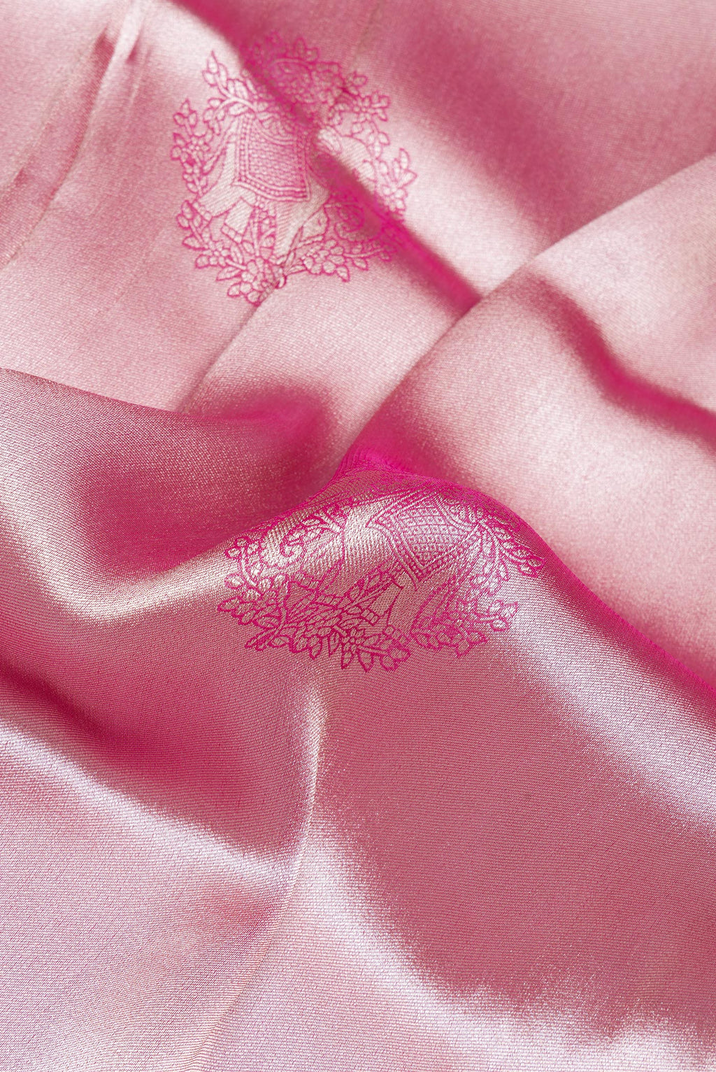 Close up of Pink Blended Banarasi Silk Saree with Zari Brocade on the body and Zari Border.  displaying folds