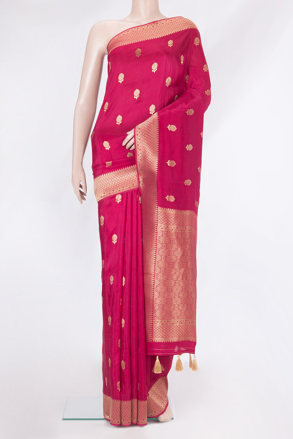 Dark Pink Blended Banarasi Silk Saree with Zari Butta on the body and Zari Border.  displayed on a mannequin