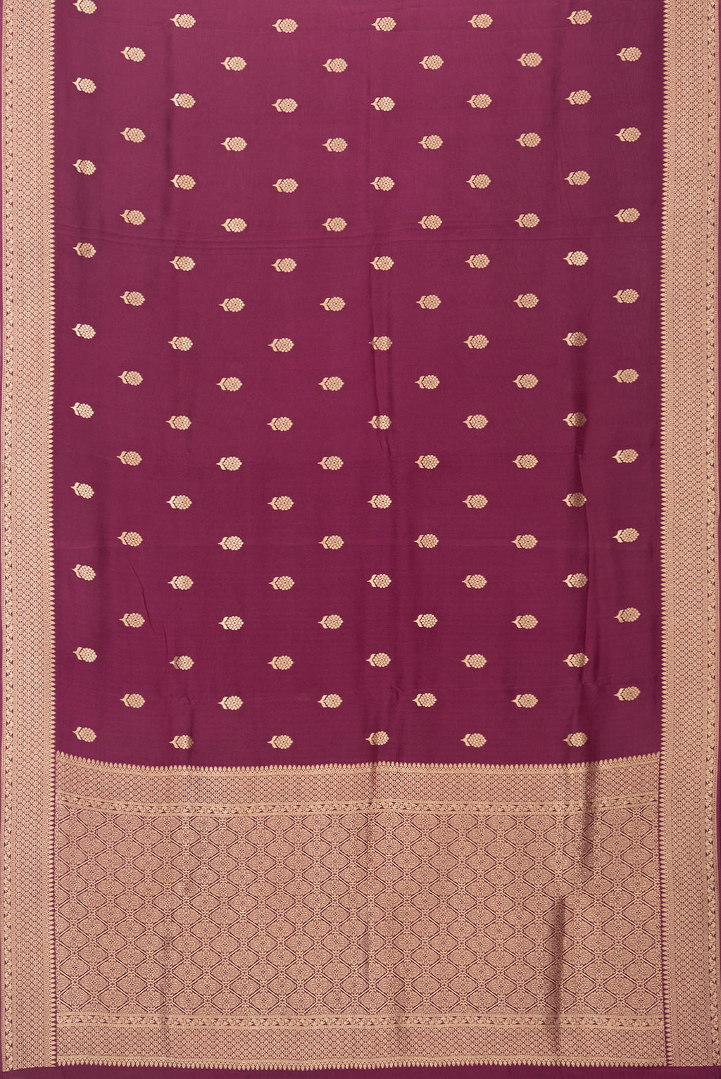 Flat view of Magenta Blended Banarasi Silk Saree with Zari Butta on the body and Fancy Border. 