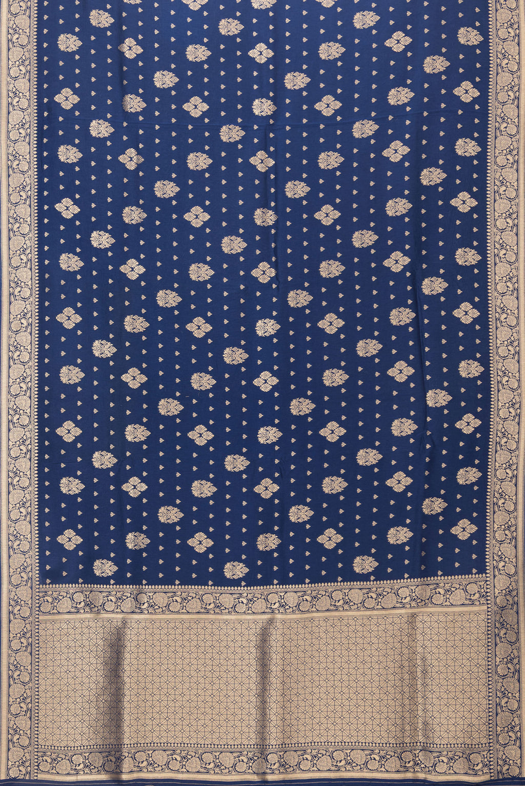 Flat view of Navy Blue Blended Banarasi Silk Saree with Zari Brocade on the body and Zari Border. 