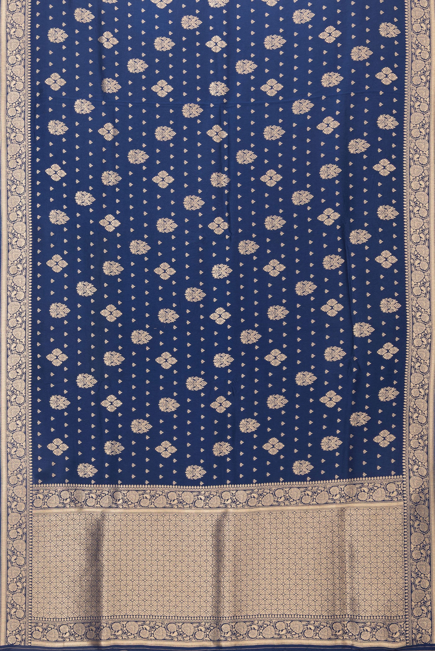 Flat view of Navy Blue Blended Banarasi Silk Saree with Zari Brocade on the body and Zari Border. 