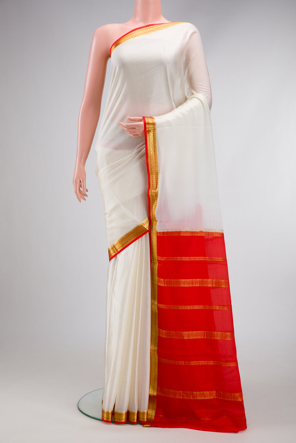 Off White Dual Tone Mysore Silk Saree with Plain Body and Zari Border.  displayed on a mannequin