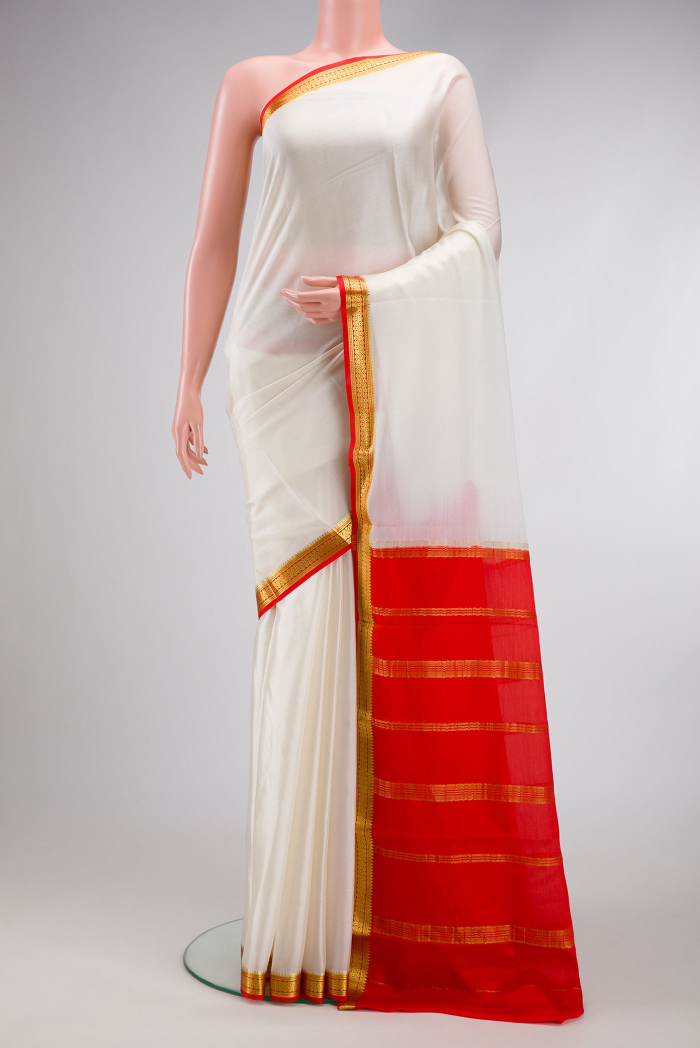 Off White Dual Tone Mysore Silk Saree with Plain Body and Zari Border.  displayed on a mannequin