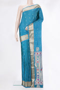Peacock Blue Blended Paithani Silk Saree with Zari Butta on the body and Zari Border.  displayed on a mannequin