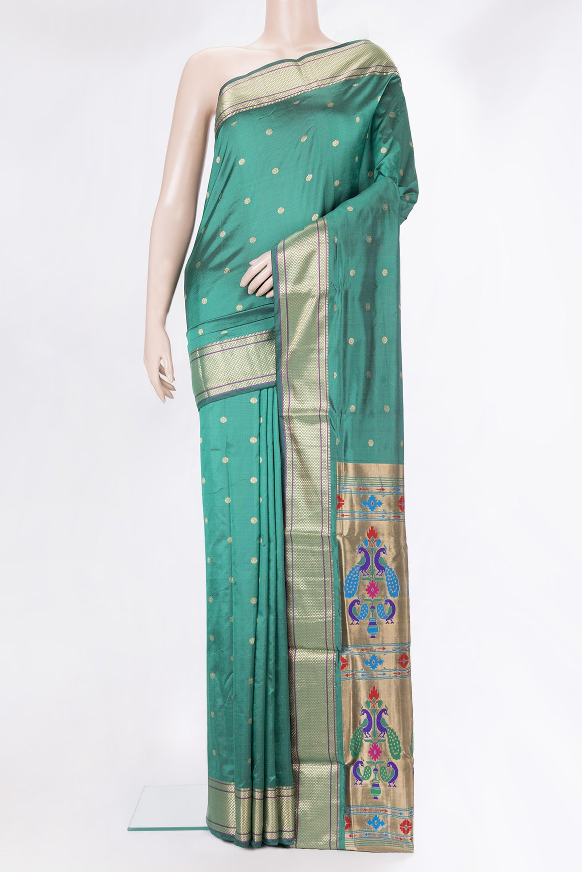Green Blended Paithani Silk Saree with Zari Butta on the body and Zari Border.  displayed on a mannequin