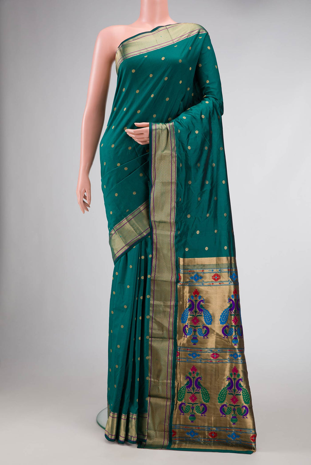 Royal Blue Dual Tone Kanchipuram Silk Saree with Zari Butta on the body and Zari Border.  displayed on a mannequin