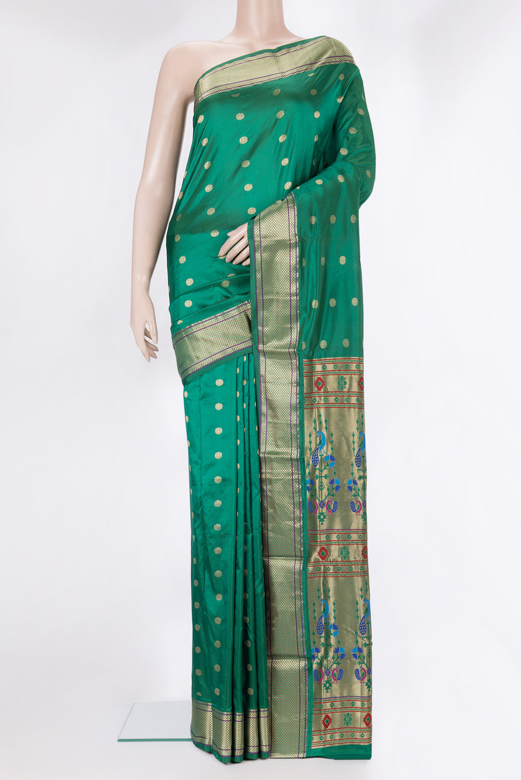 Green Blended Paithani Silk Saree with Zari Butta on the body and Zari Border.  displayed on a mannequin
