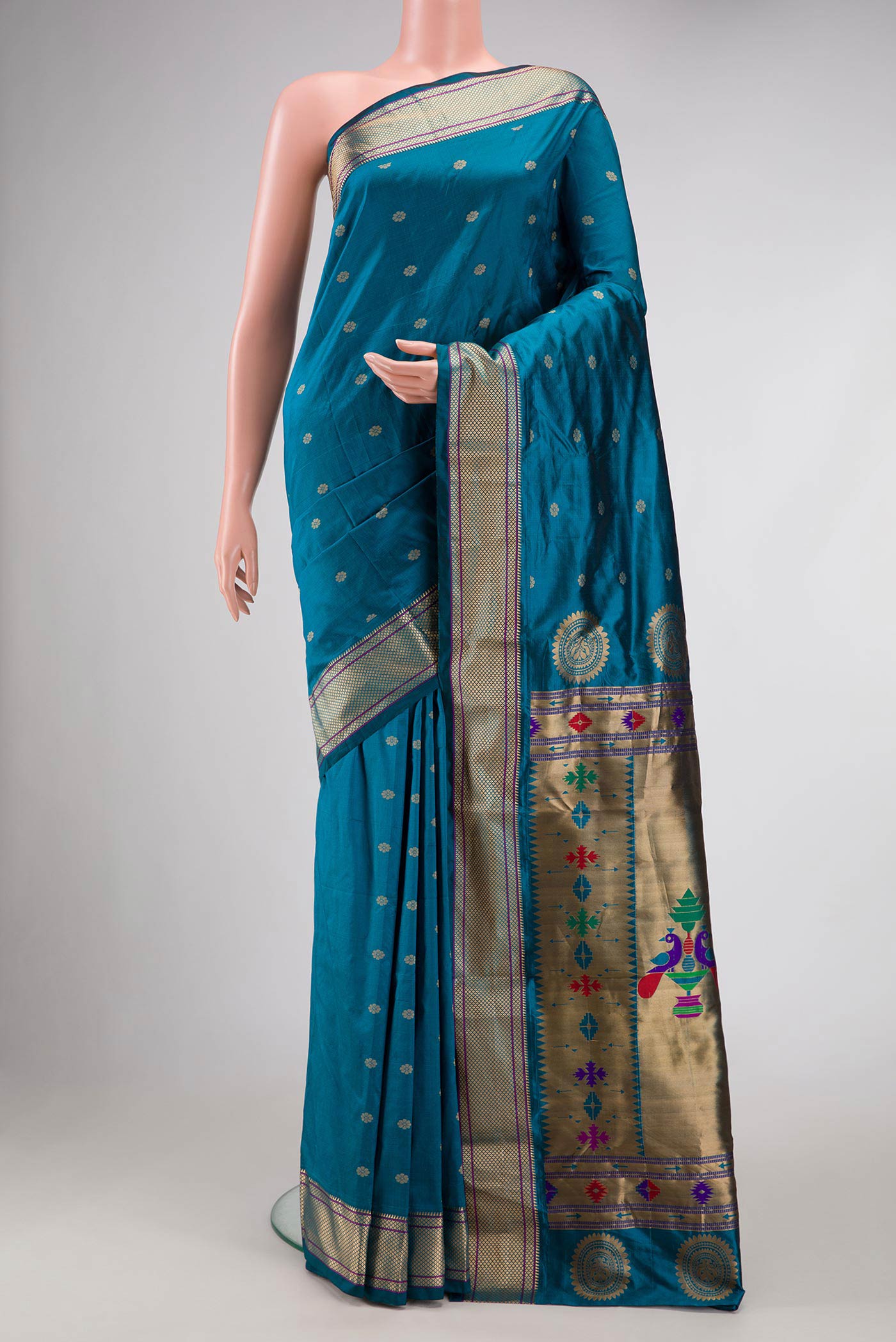 Blue Blended Bangalore Silk Saree with Zari Butta on the body and Zari Border displayed on a mannequin