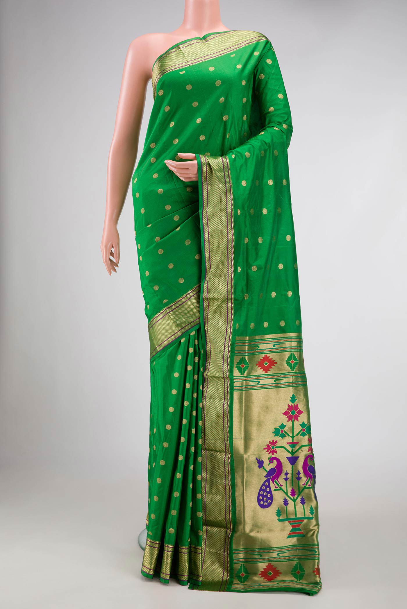 Green Dual Tone Blended Bangalore Silk Saree with Zari Butta on the body and Zari Border displayed on a mannequin