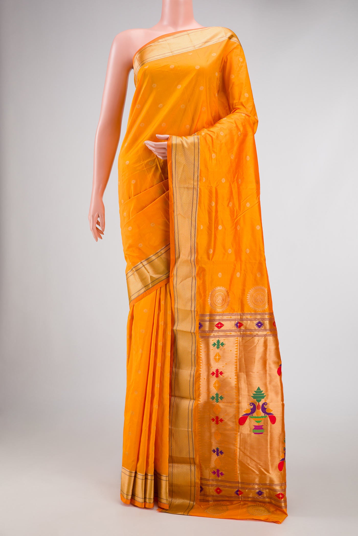 Yellow Blended Bangalore Silk Saree with Zari Butta on the body and Zari Border displayed on a mannequin