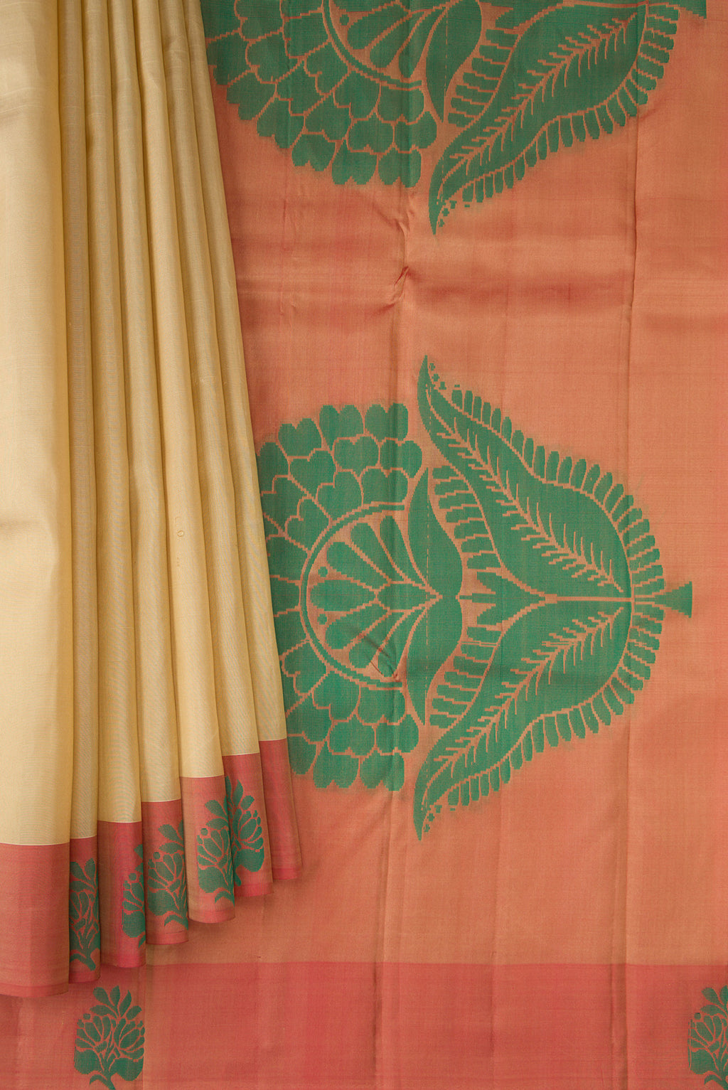 Pleats and pallu of Dark Beige Kanjivaram Silk Saree with Plain Body and Thread Border. 