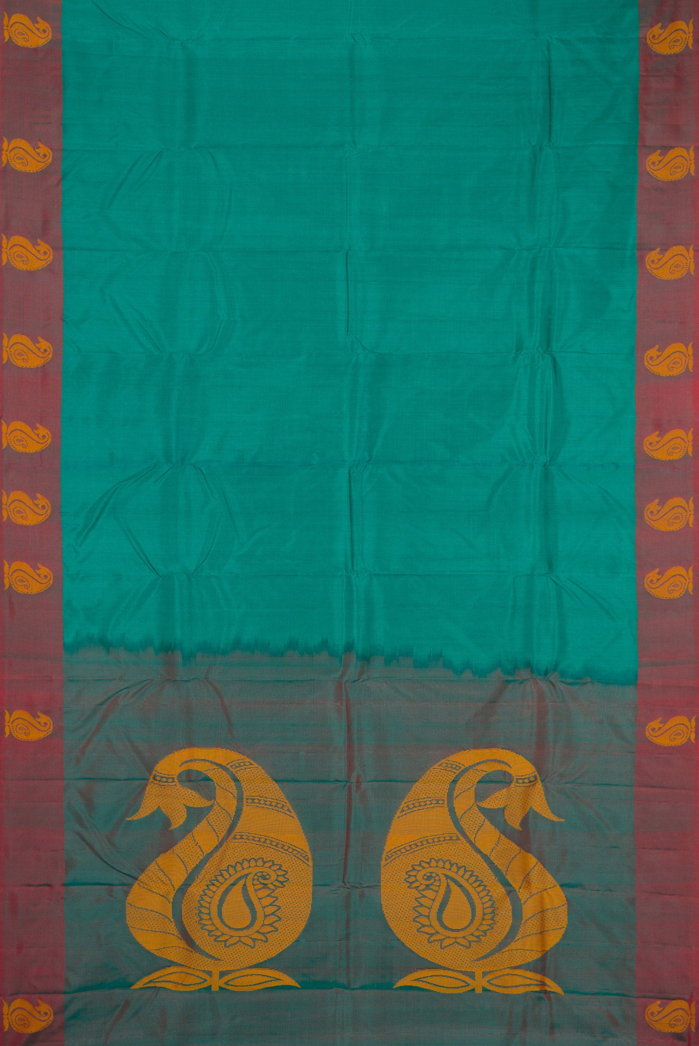 Sea Green Dual Tone Soft Silk Saree with Plain Body and Fancy Border.  displayed on a mannequin