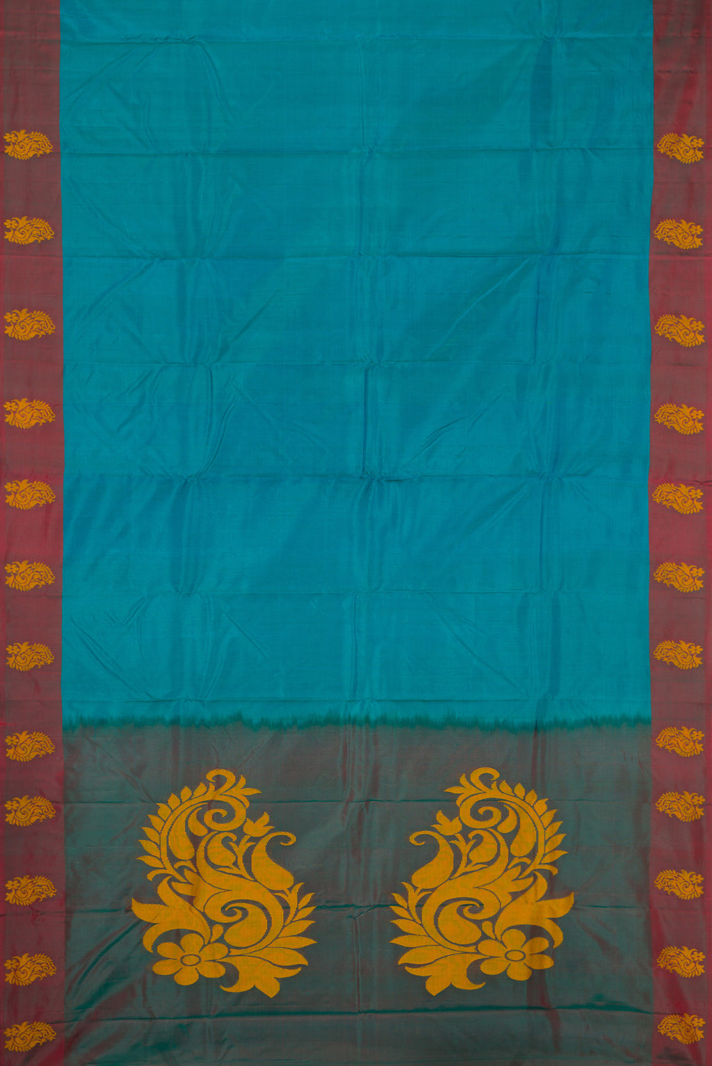 Flat view of Peacock Blue Dual Tone Soft Silk Saree with Plain Body and Fancy Border. 
