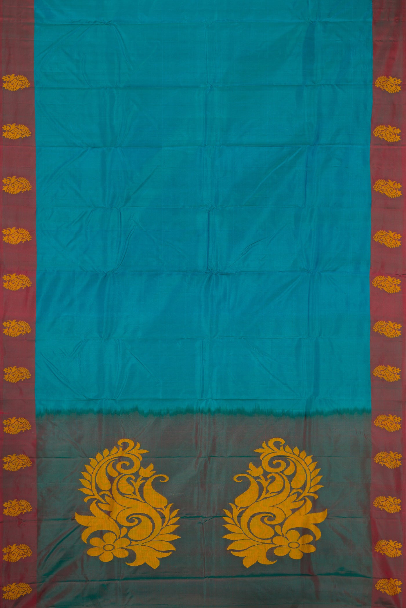 Flat view of Peacock Blue Dual Tone Soft Silk Saree with Plain Body and Fancy Border. 