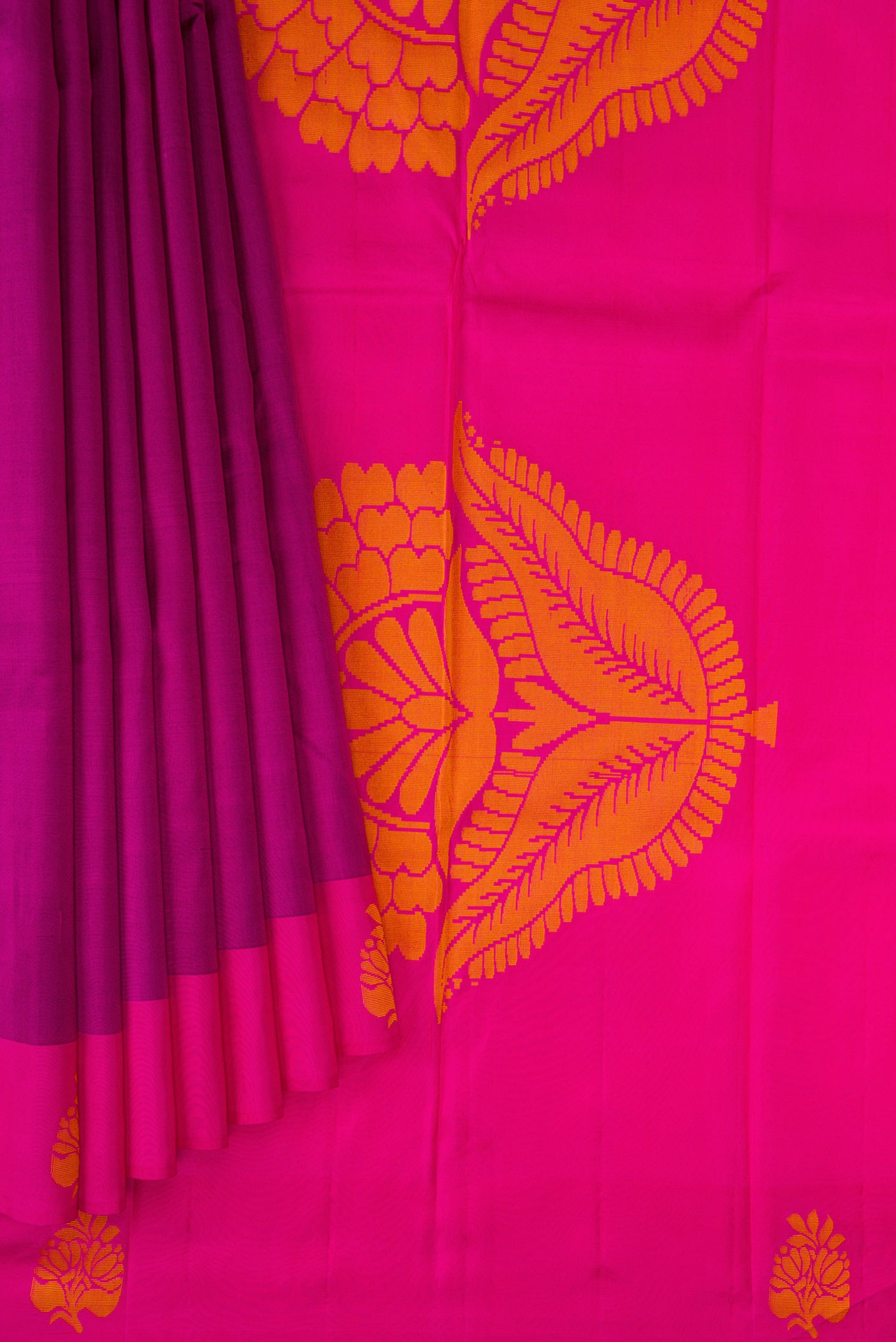Pleats and pallu of Purple Soft Silk Saree with Plain Body and Fancy Border. 