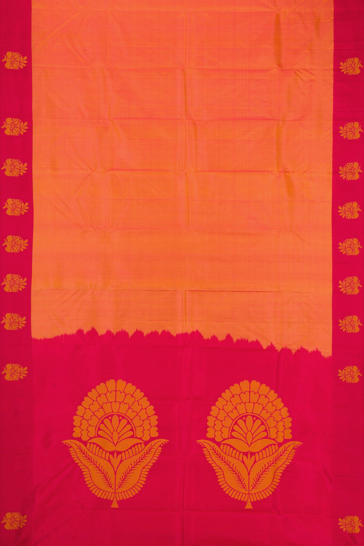 Flat view of Orange Dual Tone Soft Silk Saree with Plain Body and Fancy Border. 