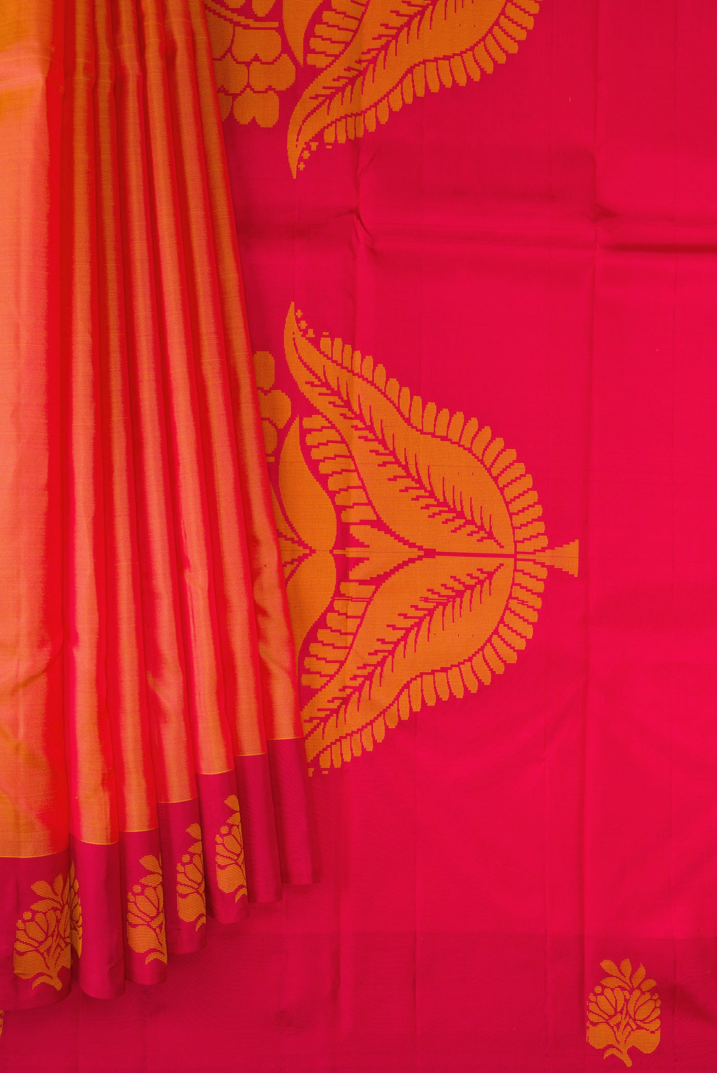 Pleats and pallu of Orange Dual Tone Soft Silk Saree with Plain Body and Fancy Border. 