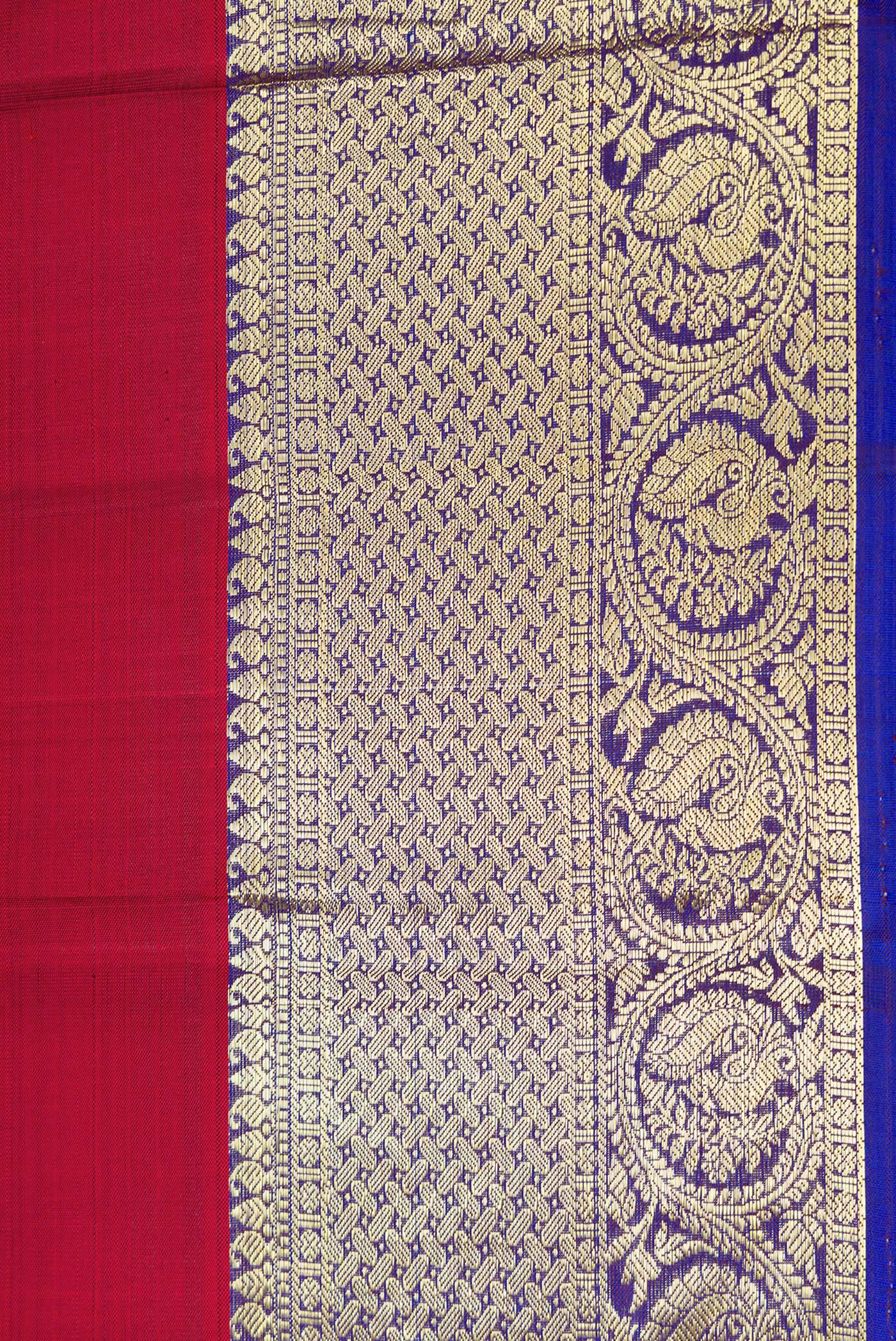 Border image of Maroon Dual Tone Kanjivaram Silk Saree with Zari Butta on the body and Zari Border. 