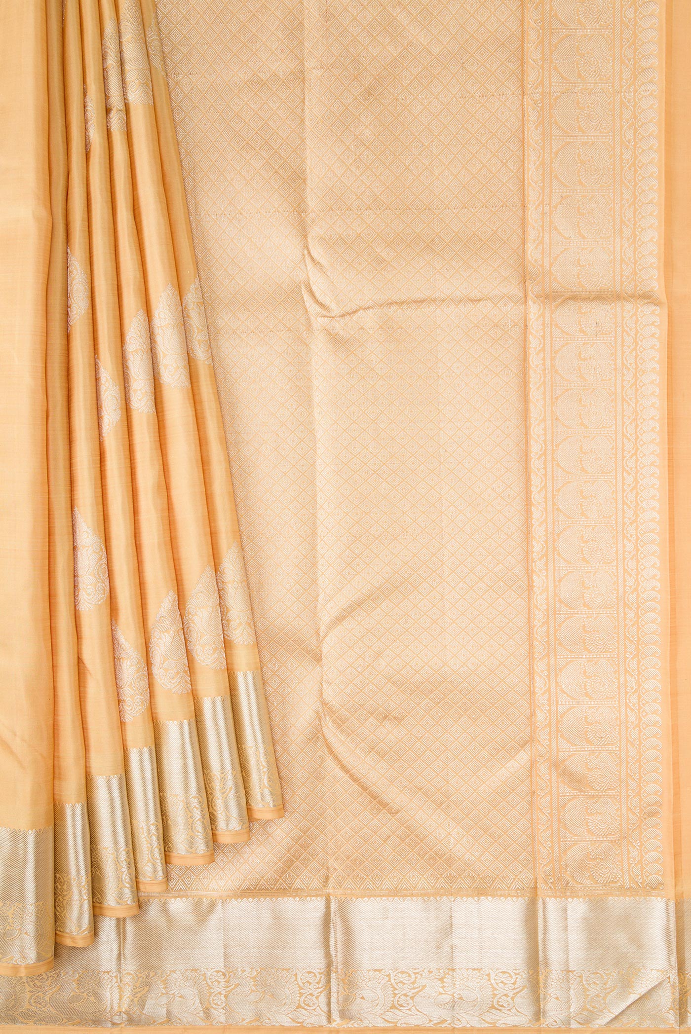Pleats and pallu of Sandal Dual Tone Kanjivaram Silk Saree with Zari Butta on the body and Zari Border. 