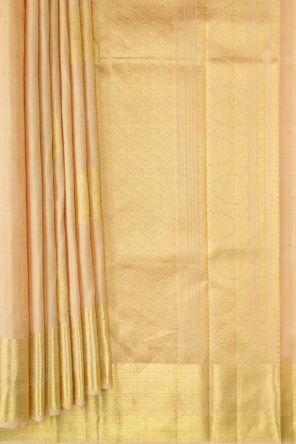 Pleats and pallu of Beige Dual Tone Kanjivaram Silk Saree with Zari Butta on the body and Zari Border. 