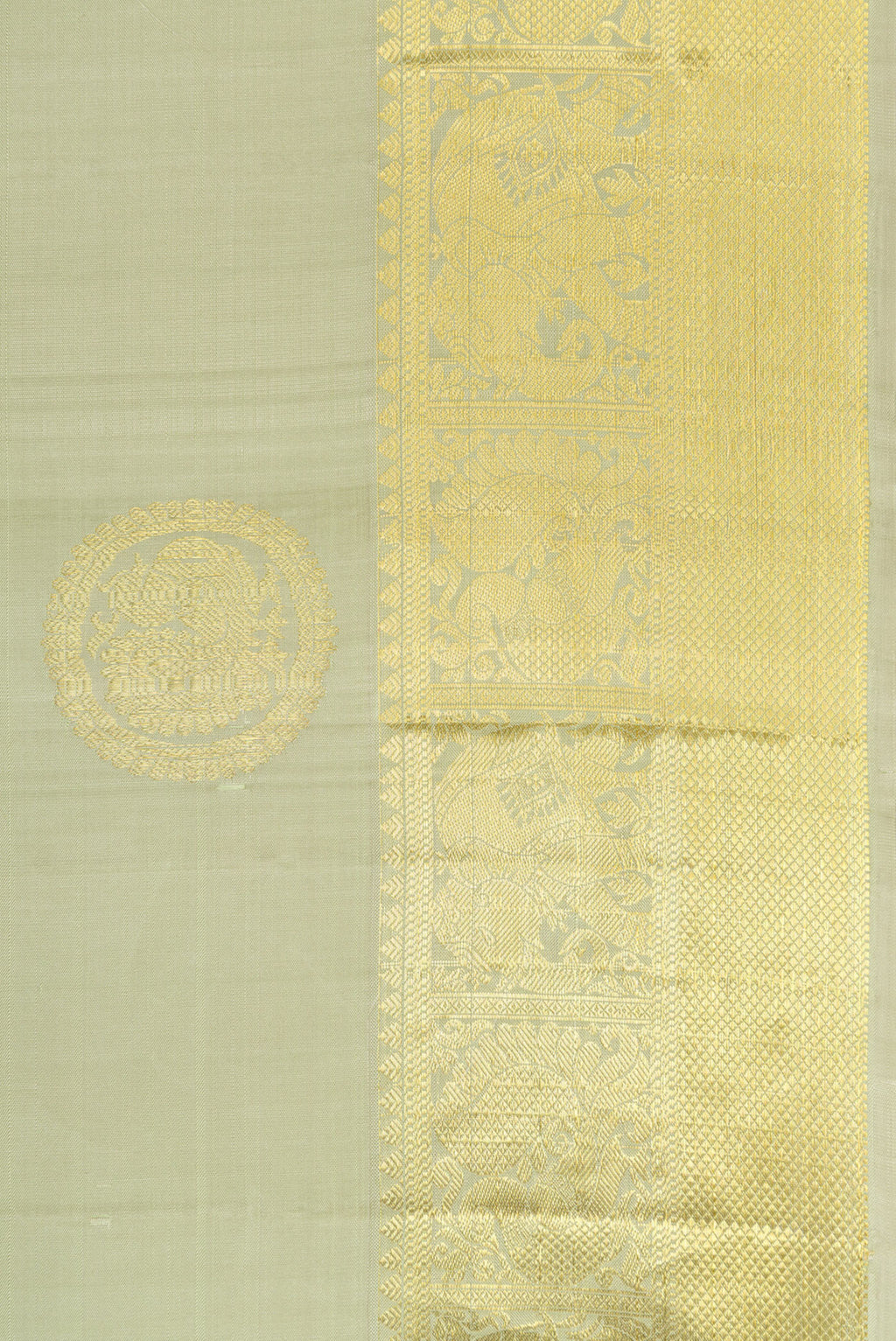 Border image of Pista Green Dual Tone Kanjivaram Silk Saree with Zari Butta on the body and Zari Border. 