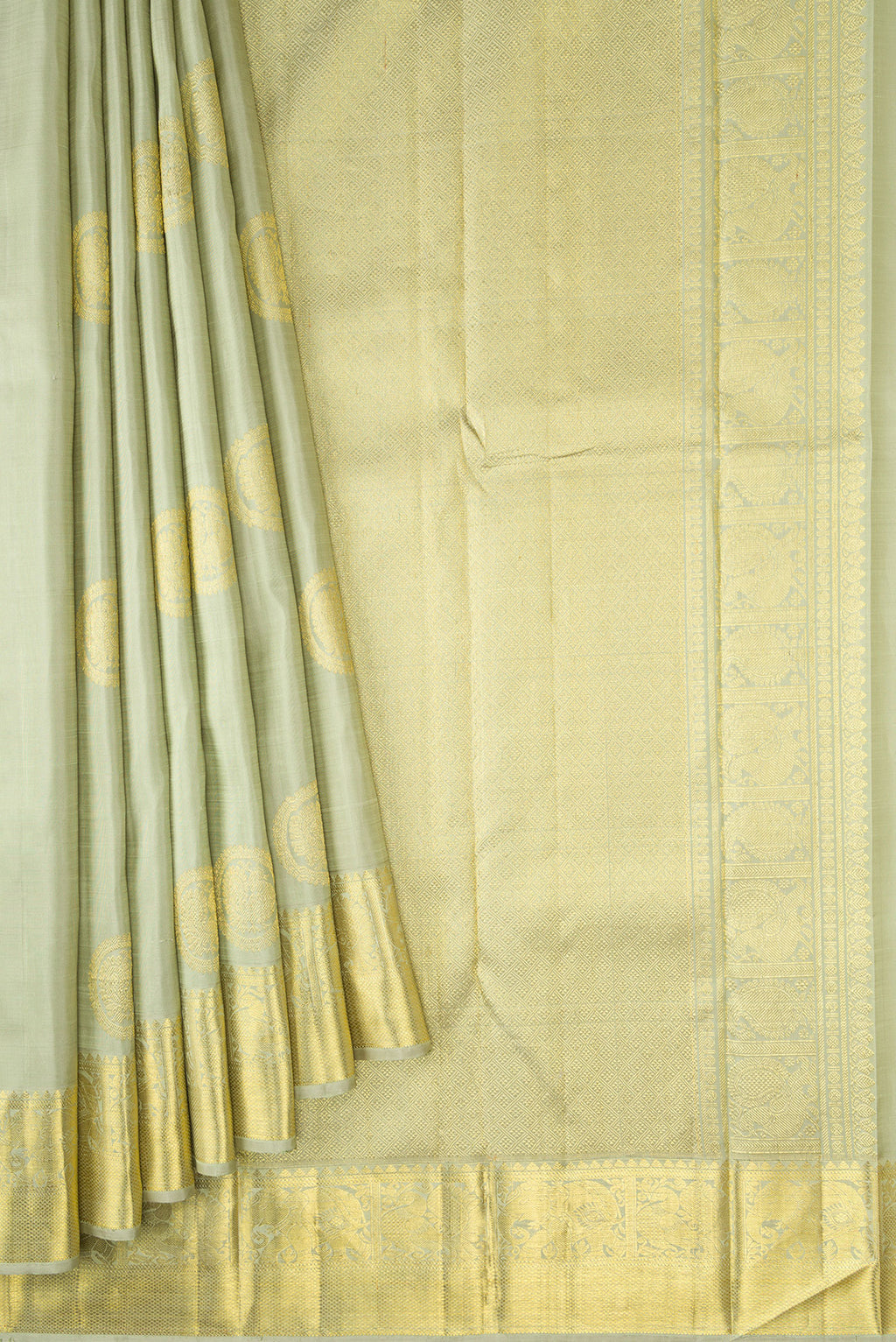 Pleats and pallu of Pista Green Dual Tone Kanjivaram Silk Saree with Zari Butta on the body and Zari Border. 