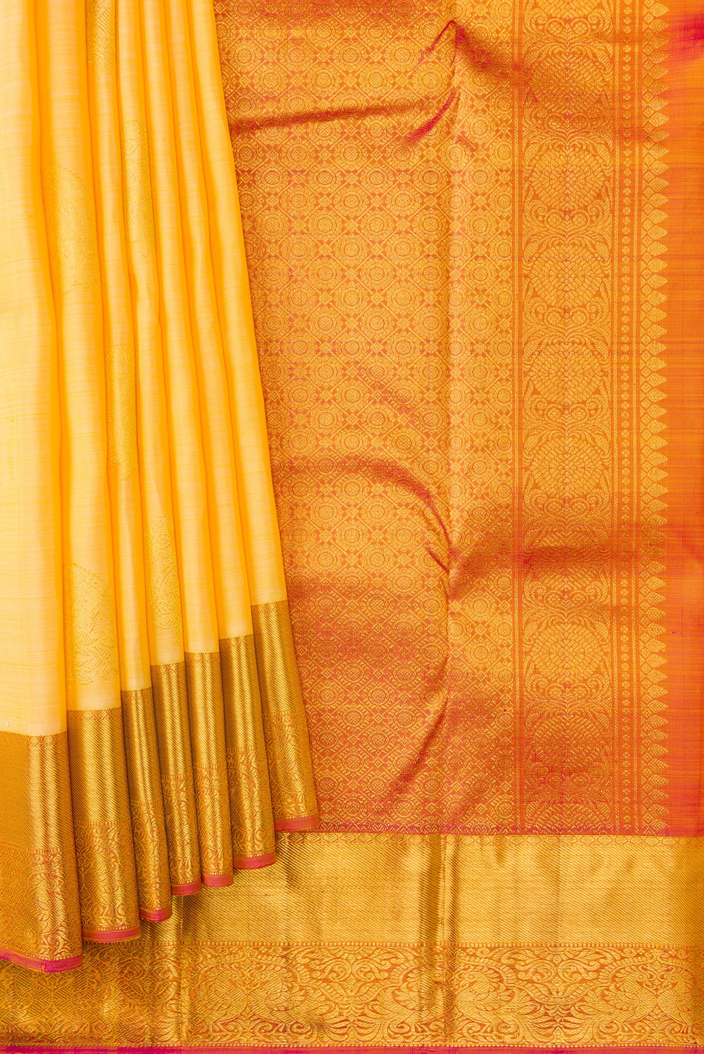 Pleats and pallu of Sandal Dual Tone Kanjivaram Silk Saree with Zari Butta on the body and Zari Border. 