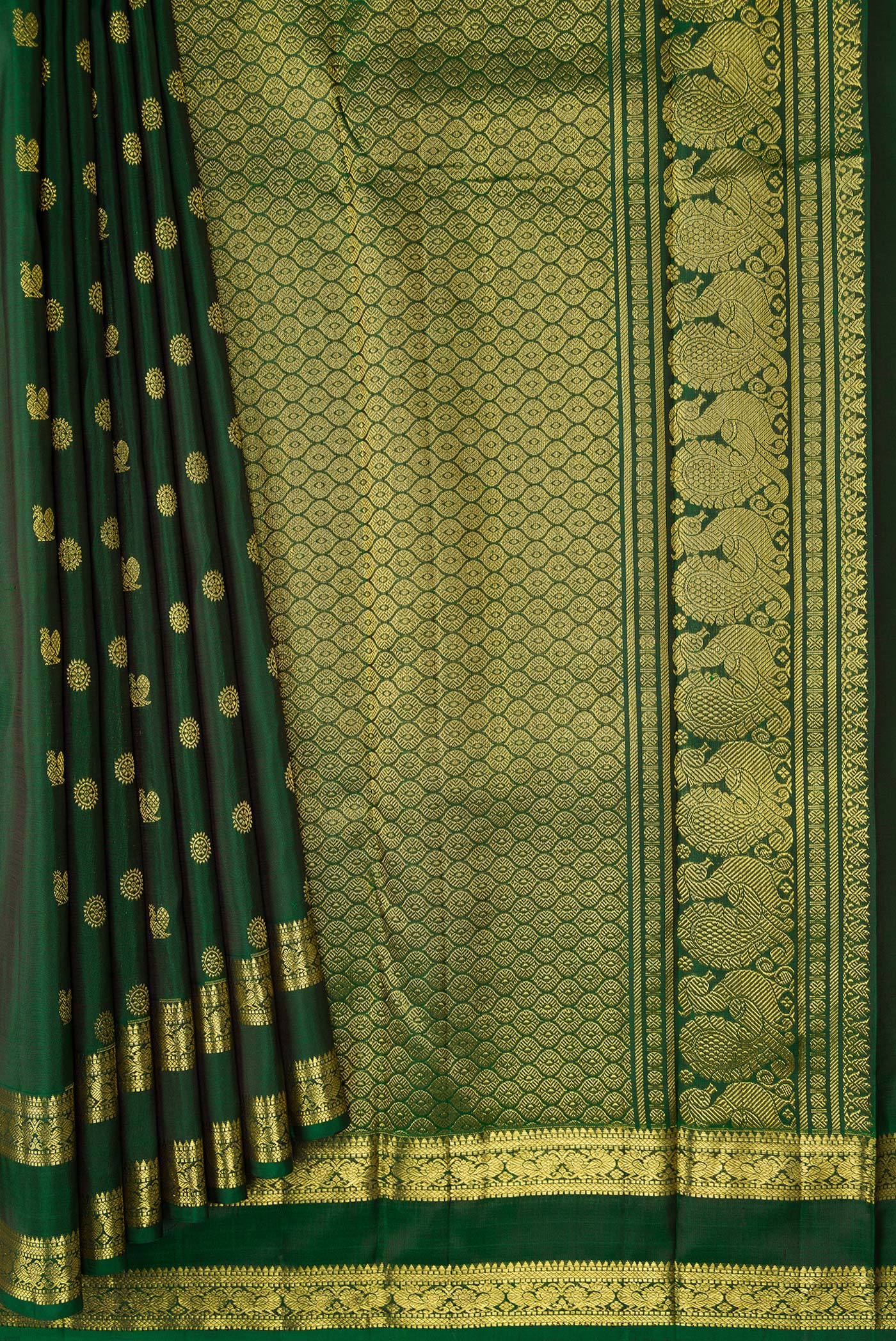 Pleats and pallu of Green Dual Tone Kanjivaram Silk Saree with Zari Butta on the body and Zari Border. 