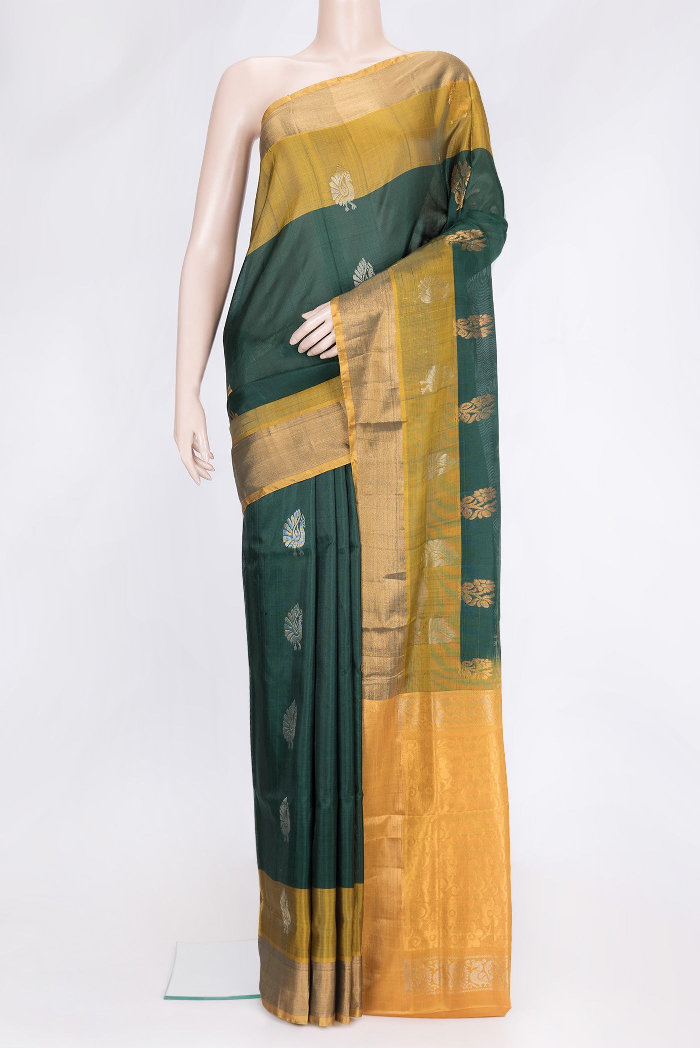 Bottle Green Dual Tone Uppada Silk Saree with Zari Butta on the body and Fancy Border.  displayed on a mannequin