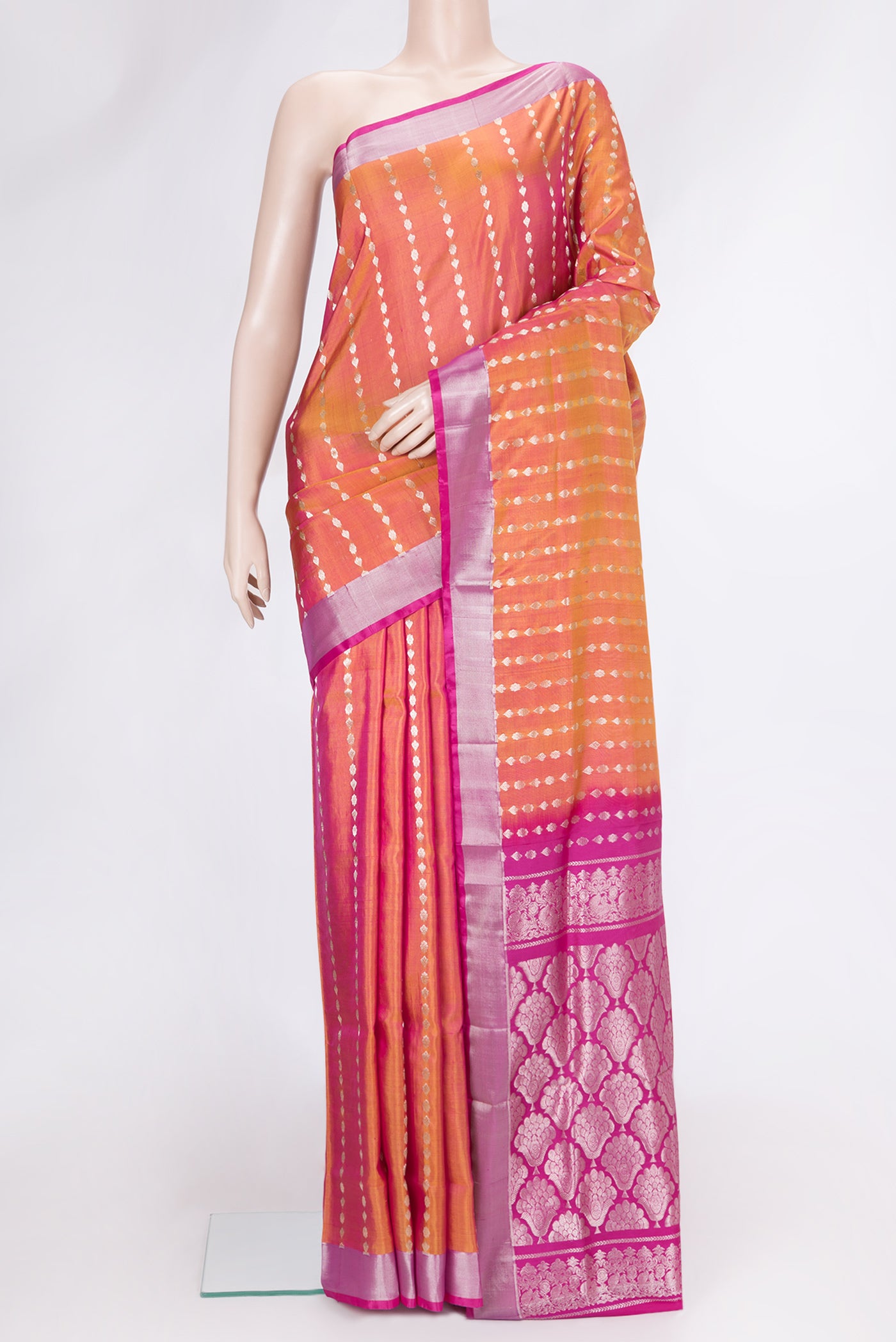 Mustard Dual Tone Uppada Silk Saree with Zari Butta on the body and Zari Border.  displayed on a mannequin