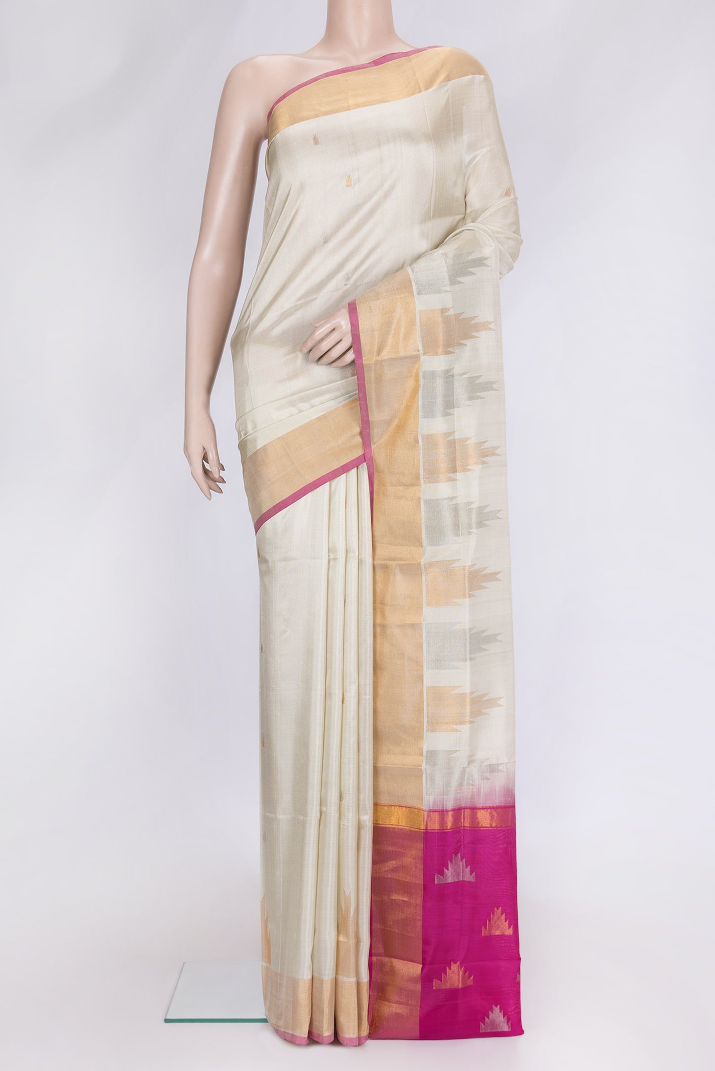 Beige Dual Tone Uppada Silk Saree with Zari Butta on the body and Temple Border.  displayed on a mannequin