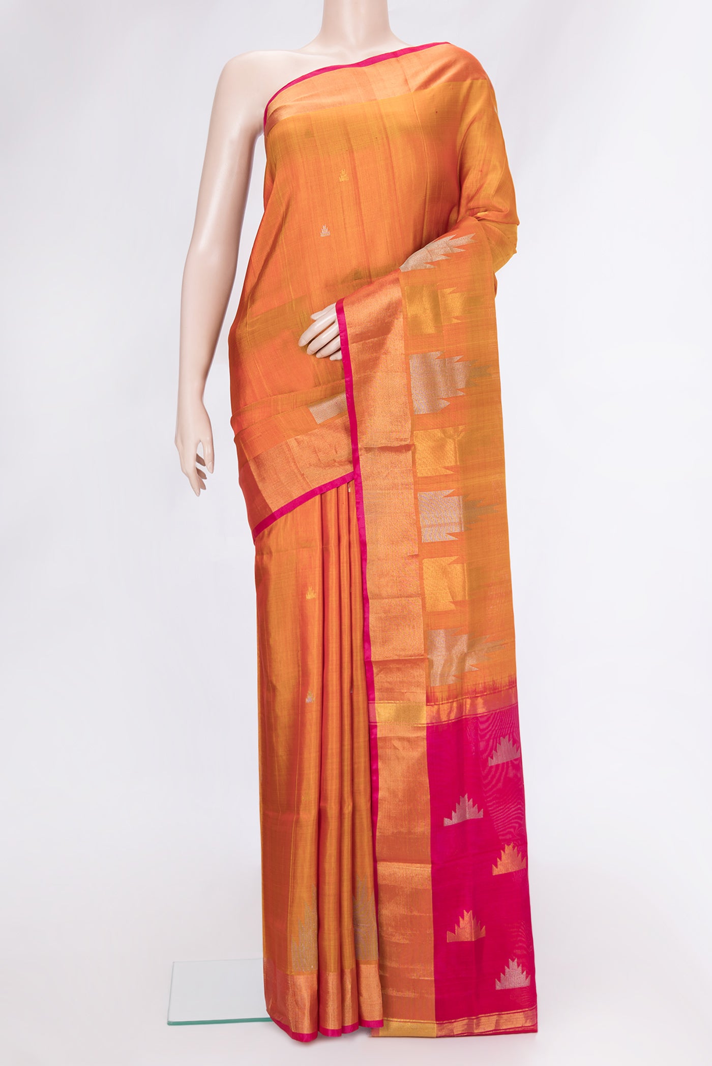 Mustard Dual Tone Uppada Silk Saree with Zari Butta on the body and Temple Border.  displayed on a mannequin