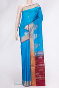 Sky Blue Dual Tone Uppada Silk Saree with Zari Butta on the body and Temple Border.  displayed on a mannequin