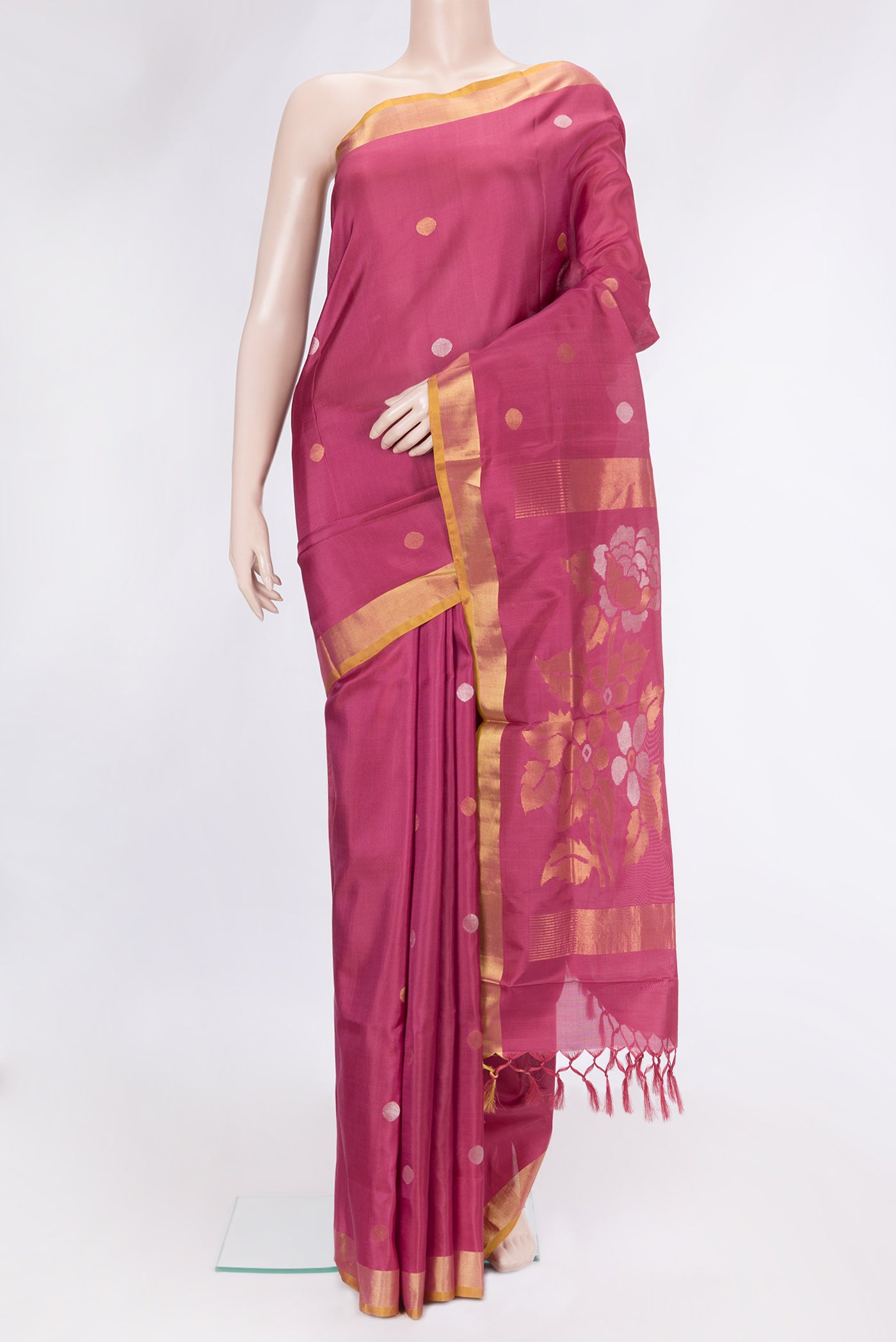 Dark Pink Dual Tone Uppada Silk Saree with Zari And Thread Butta on the body and Zari Border.  displayed on a mannequin