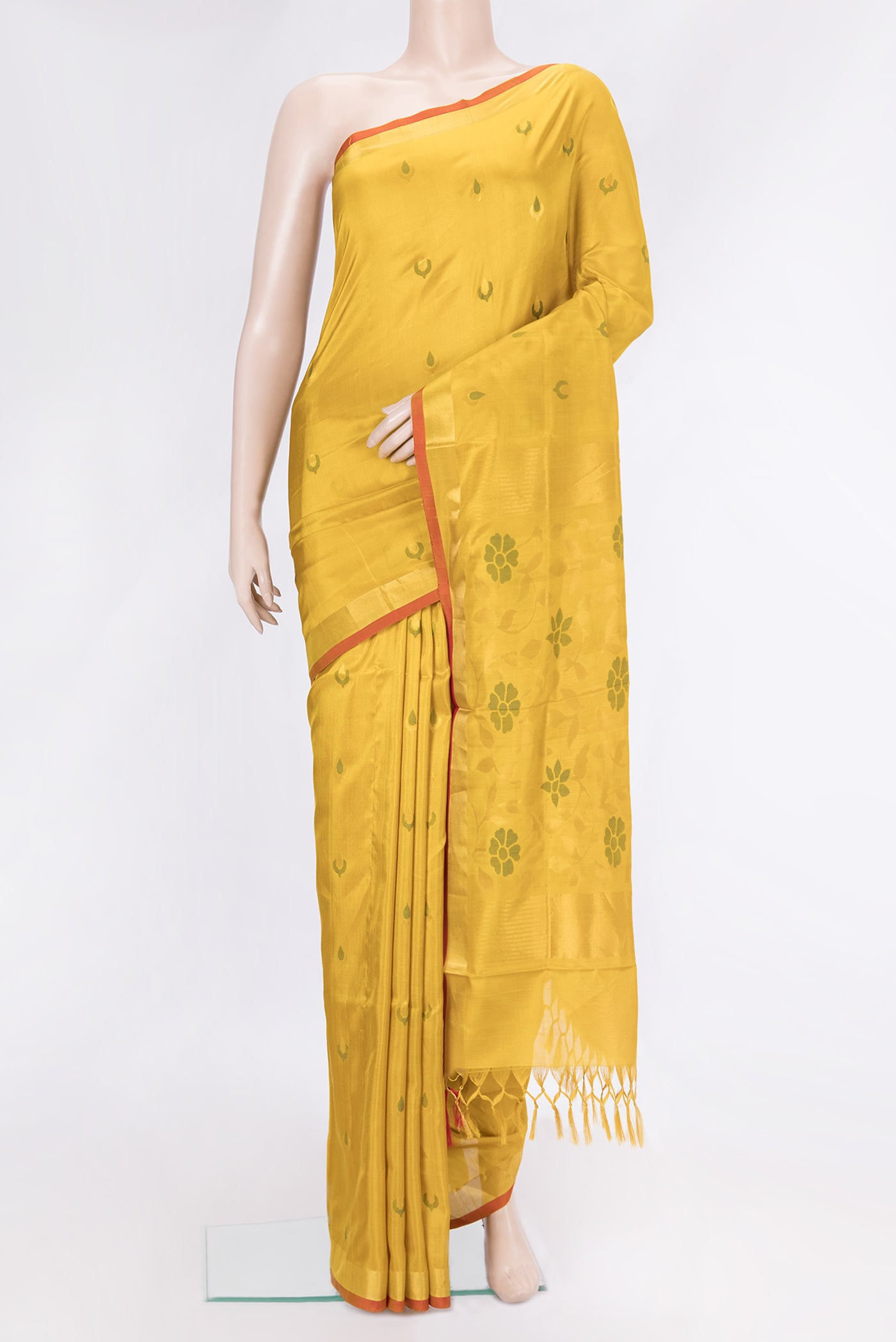 Mustard Dual Tone Uppada Silk Saree with Zari And Thread Butta on the body and Zari Border.  displayed on a mannequin